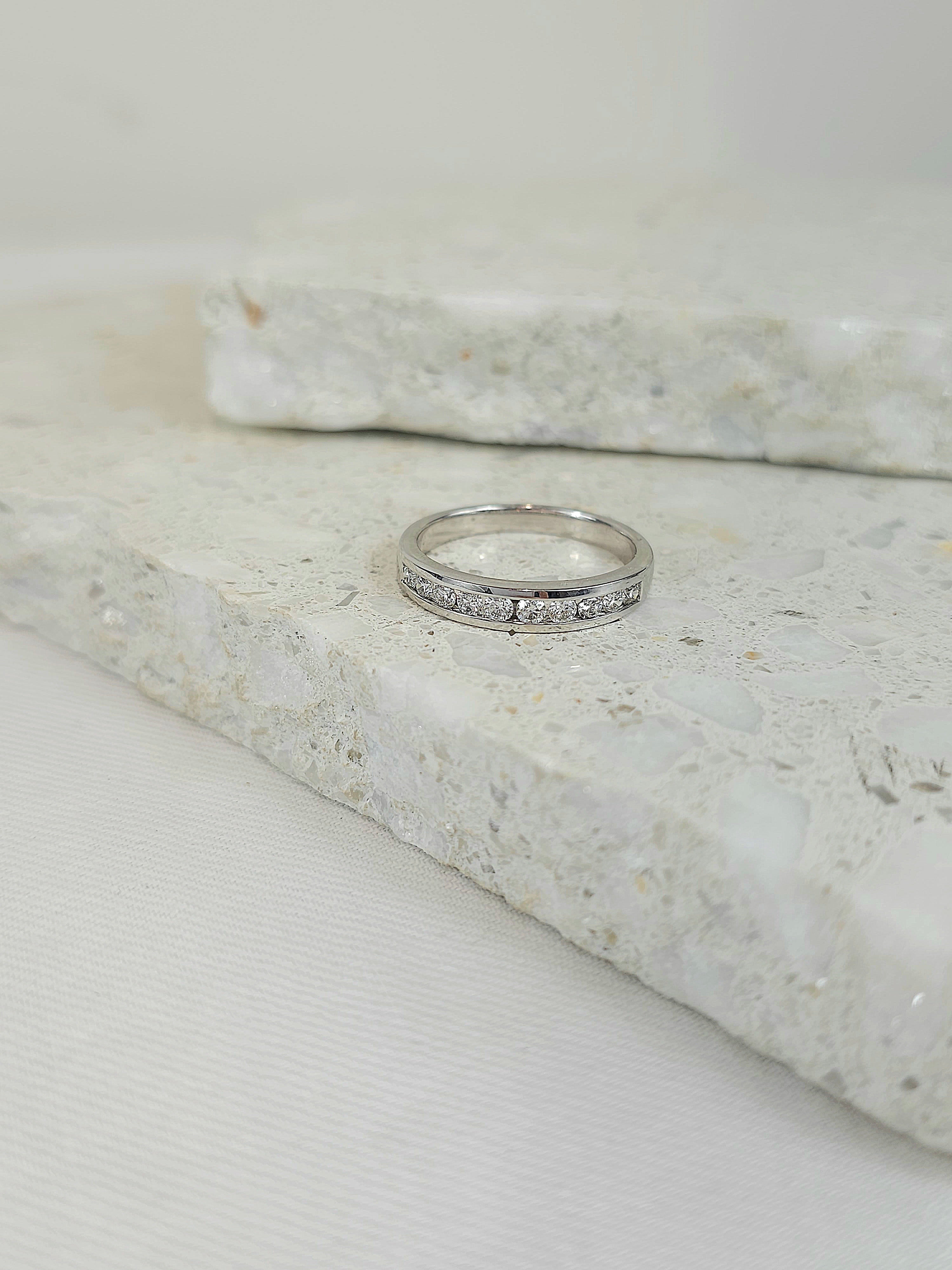 18ct White Gold Round Brilliant cut Diamond channel set wedding band, equalling 0.40ct