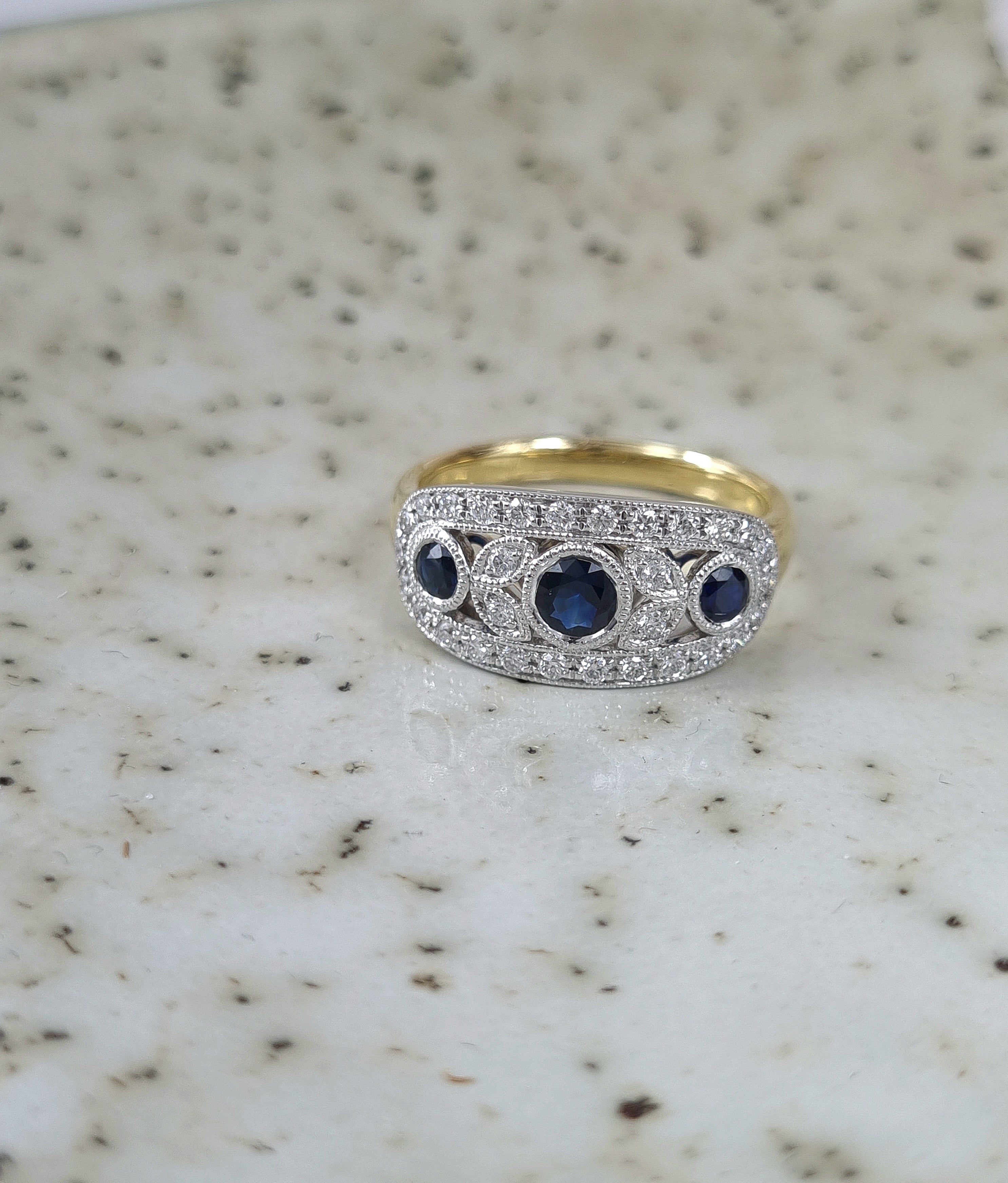 18ct Yellow and White Gold Sapphire and Diamond ring