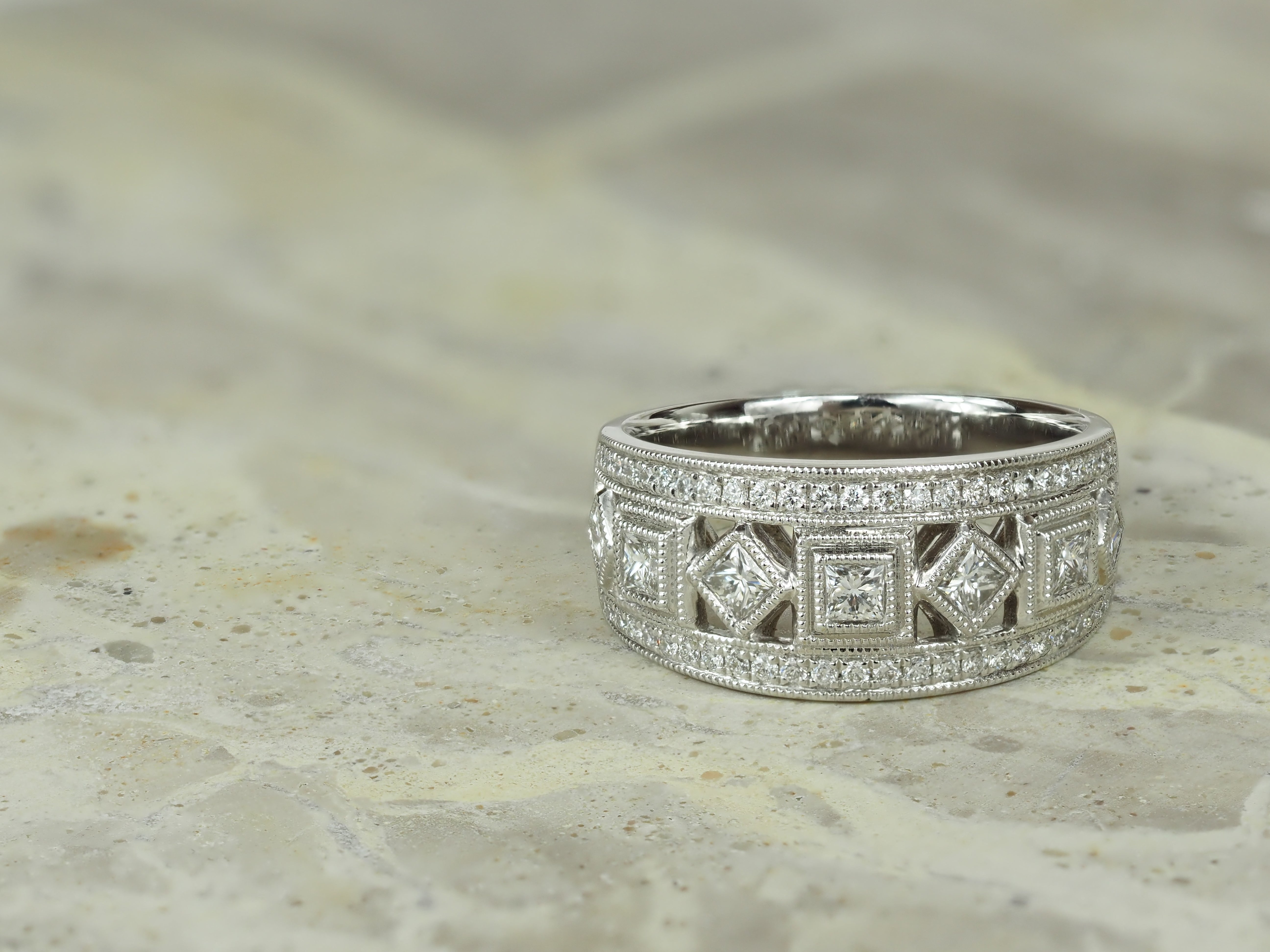 18ct White Gold Round Brilliant and Princess Cut Diamond Dress Ring