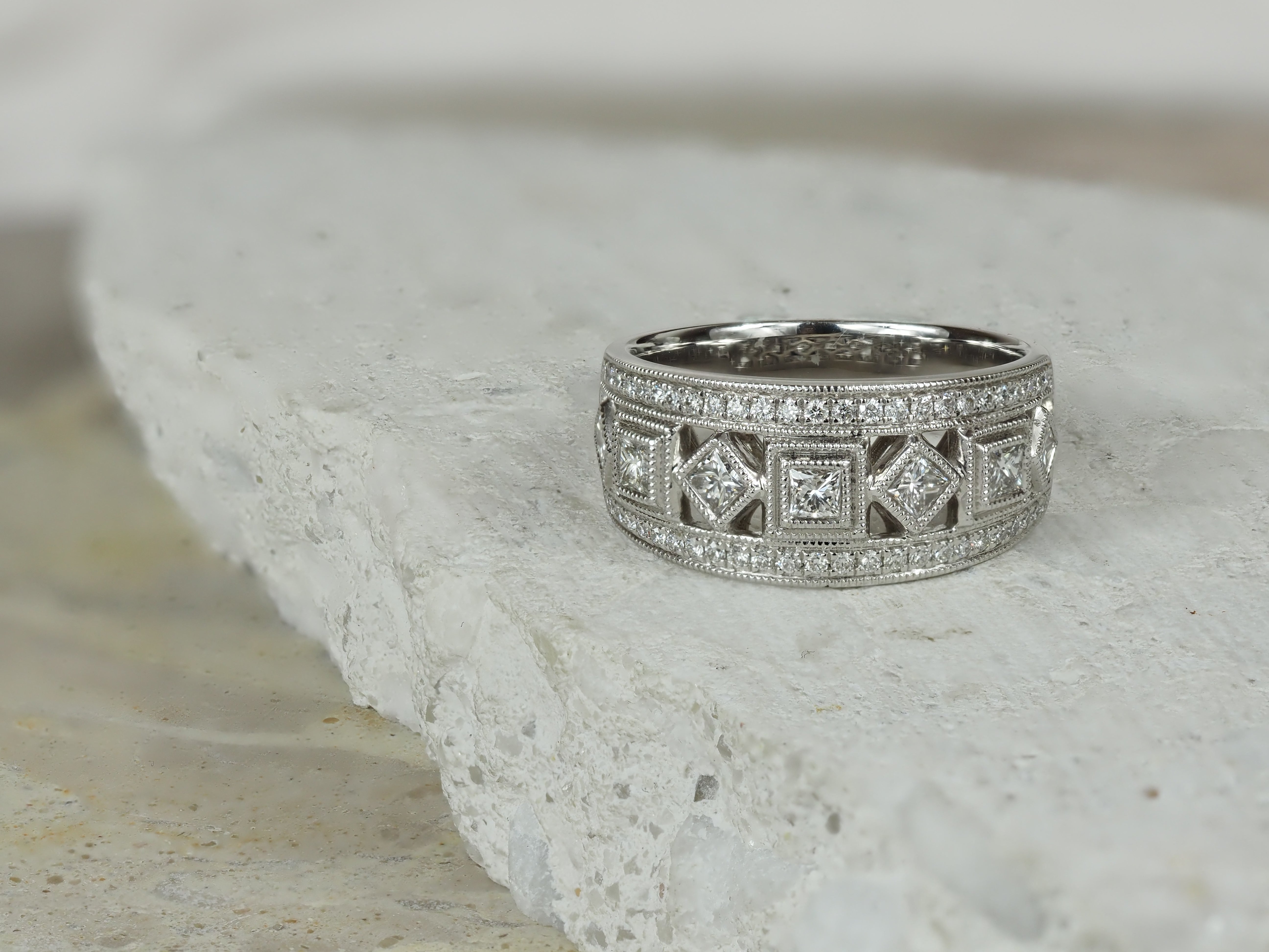 18ct White Gold Round Brilliant and Princess Cut Diamond Dress Ring