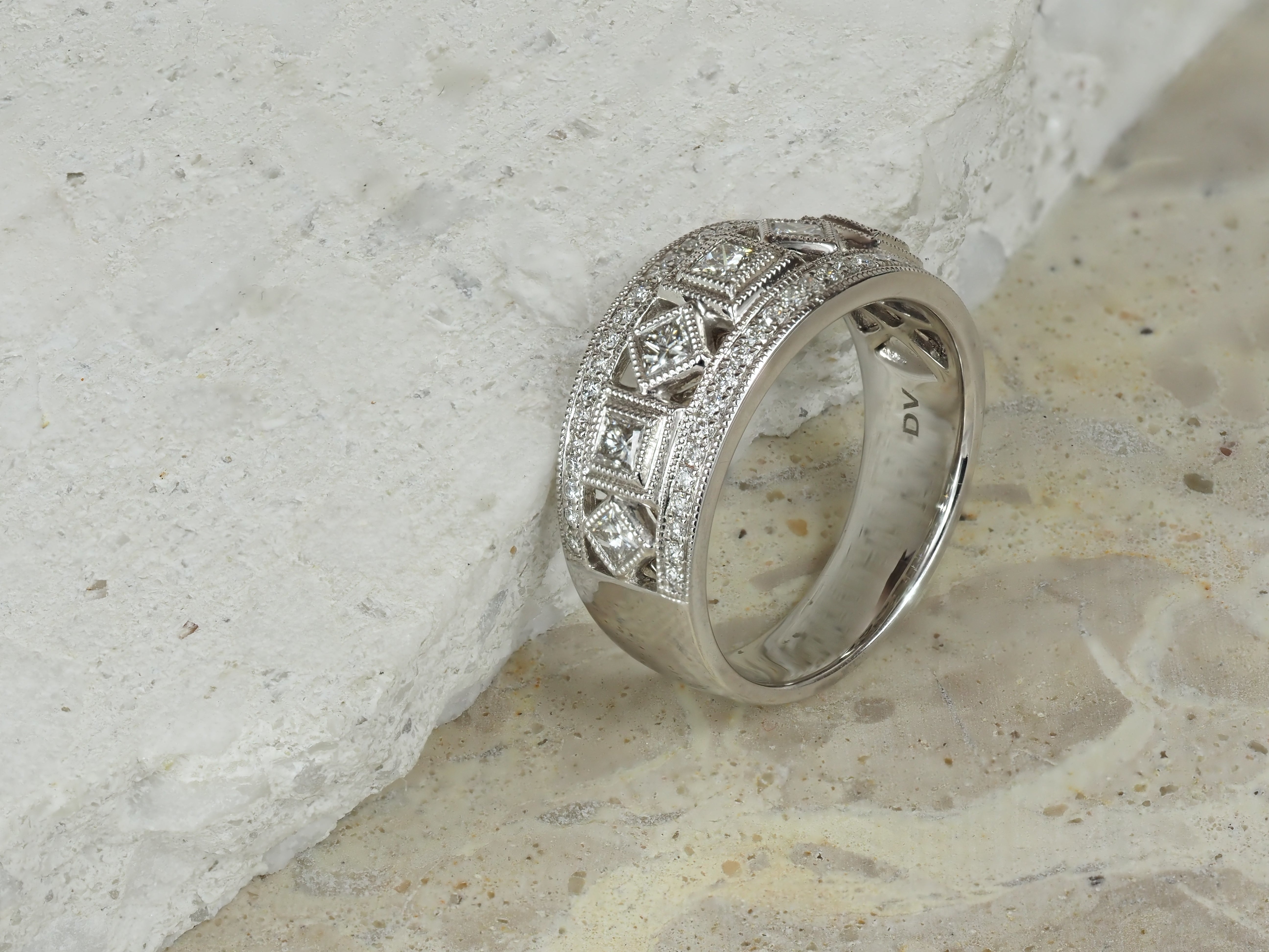 18ct White Gold Round Brilliant and Princess Cut Diamond Dress Ring