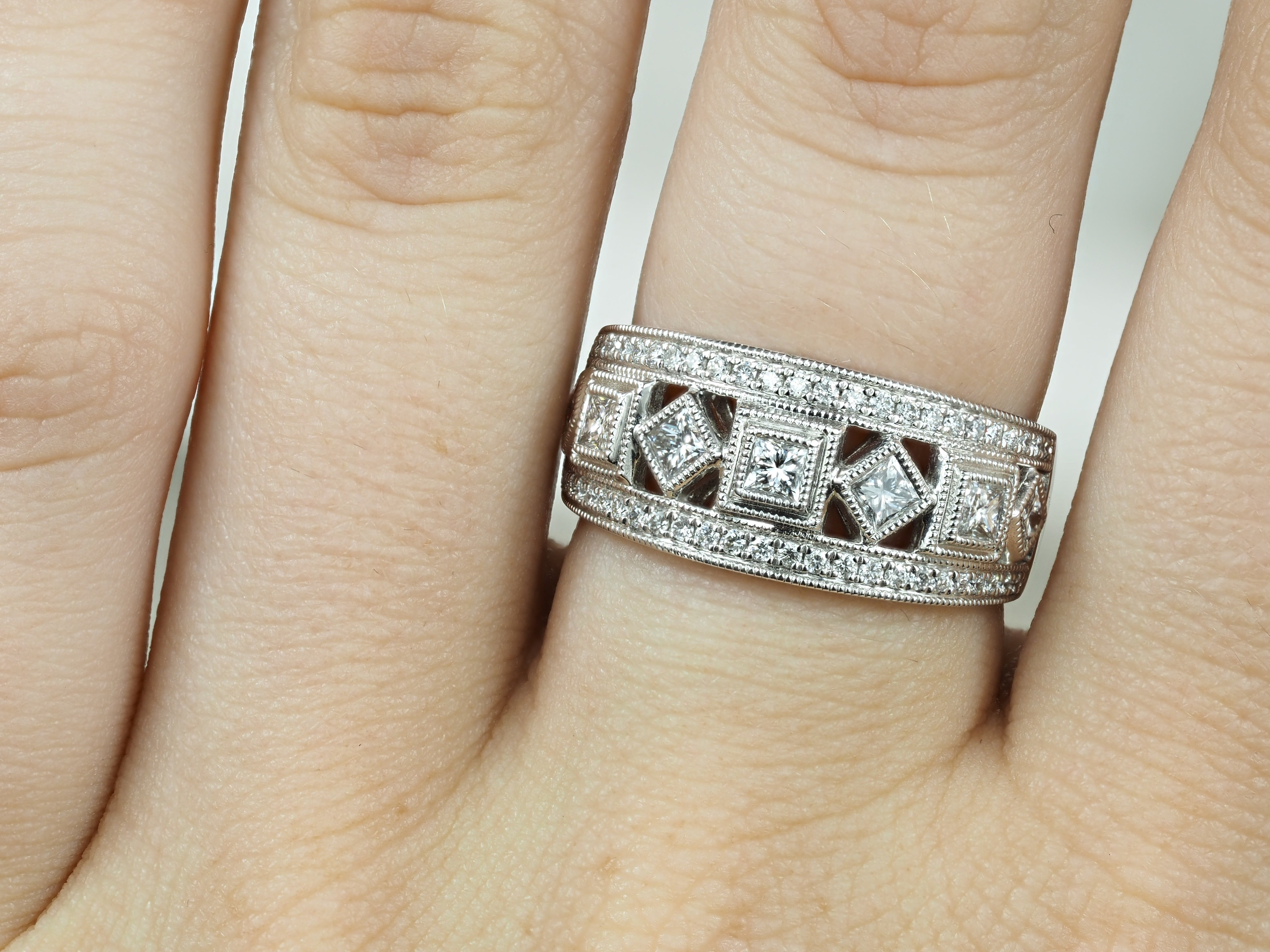 18ct White Gold Round Brilliant and Princess Cut Diamond Dress Ring