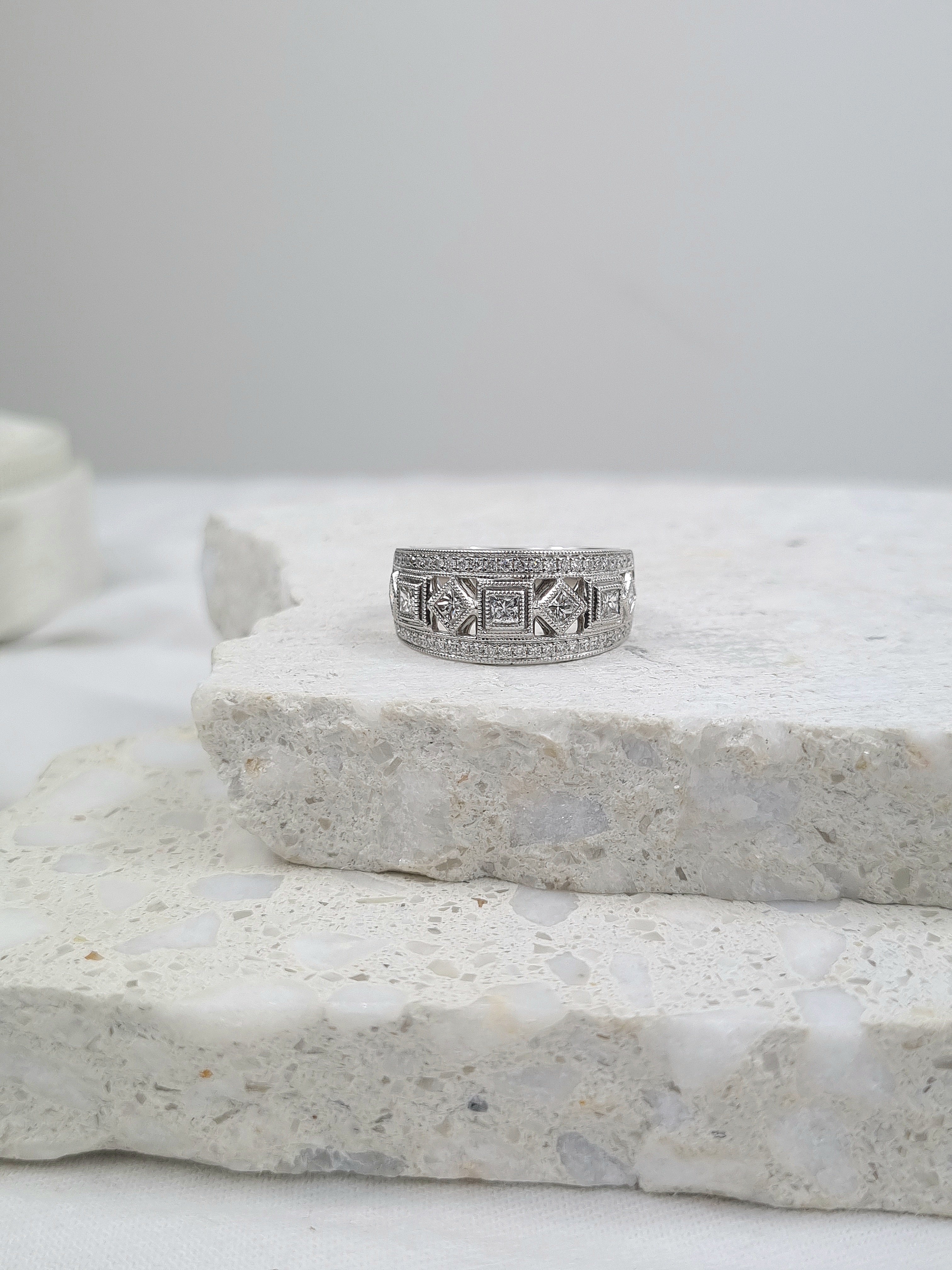 18ct White Gold Round Brilliant and Princess Cut Diamond Dress Ring