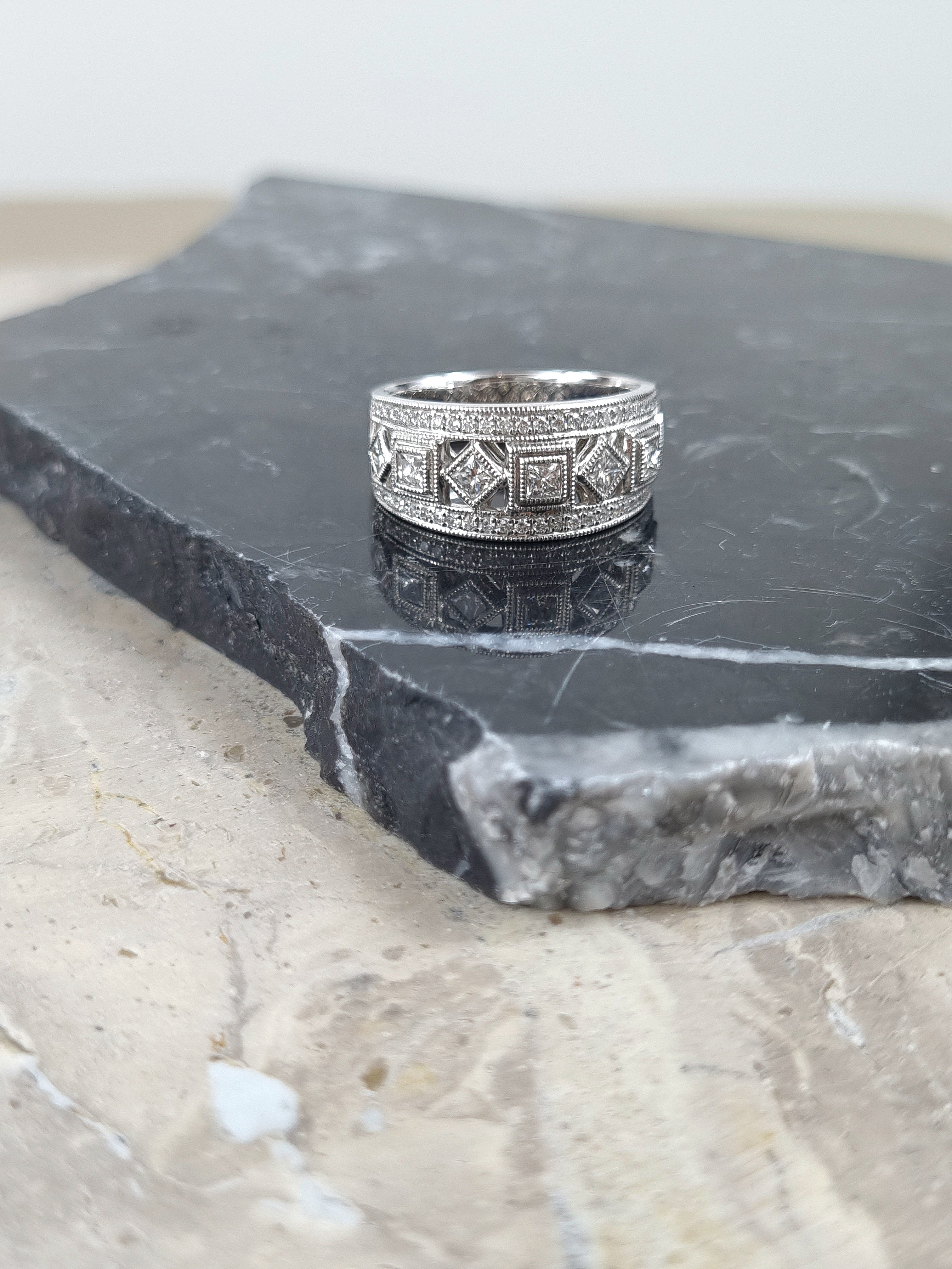 18ct White Gold Round Brilliant and Princess Cut Diamond Dress Ring