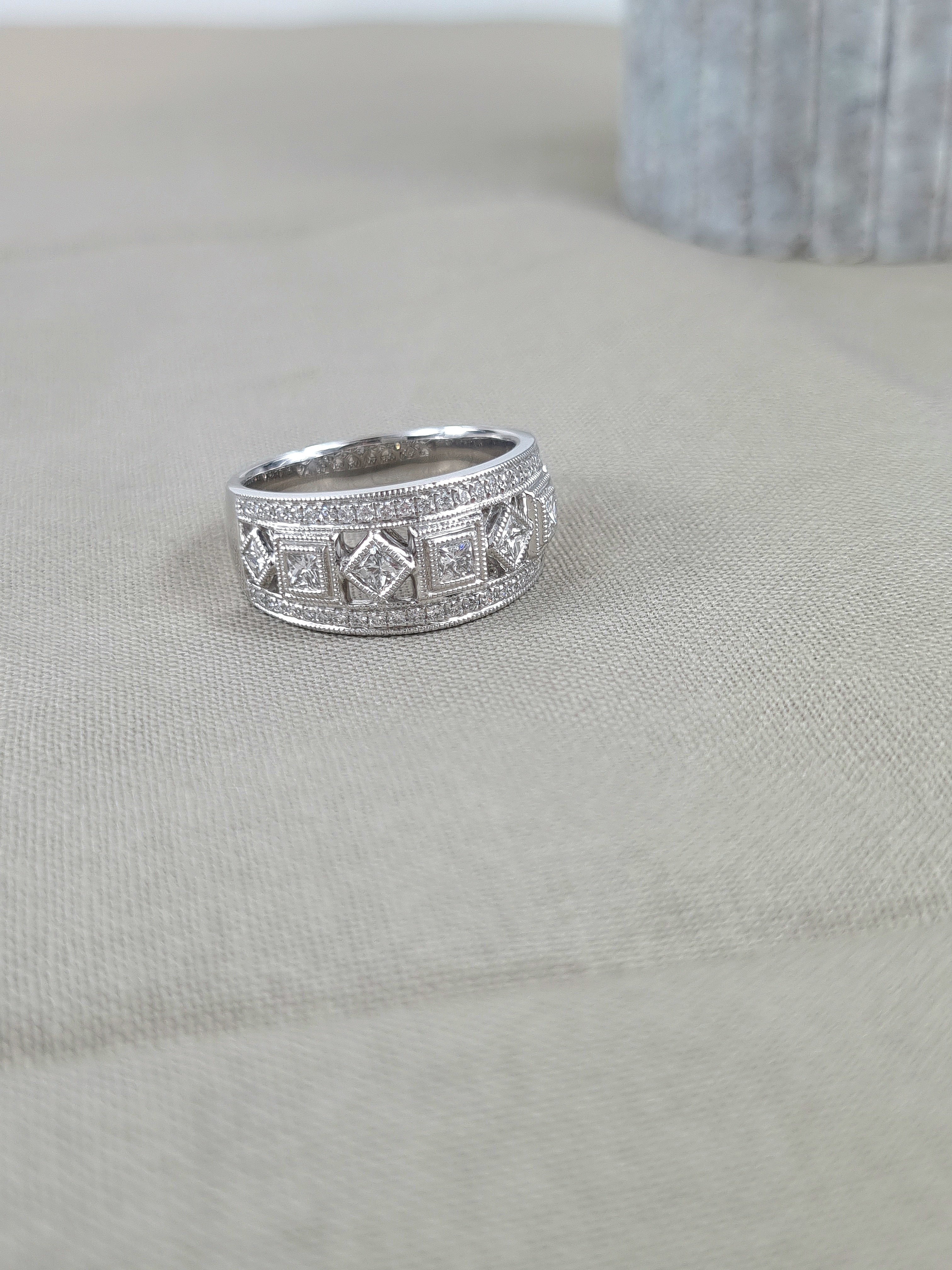 18ct White Gold Round Brilliant and Princess Cut Diamond Dress Ring