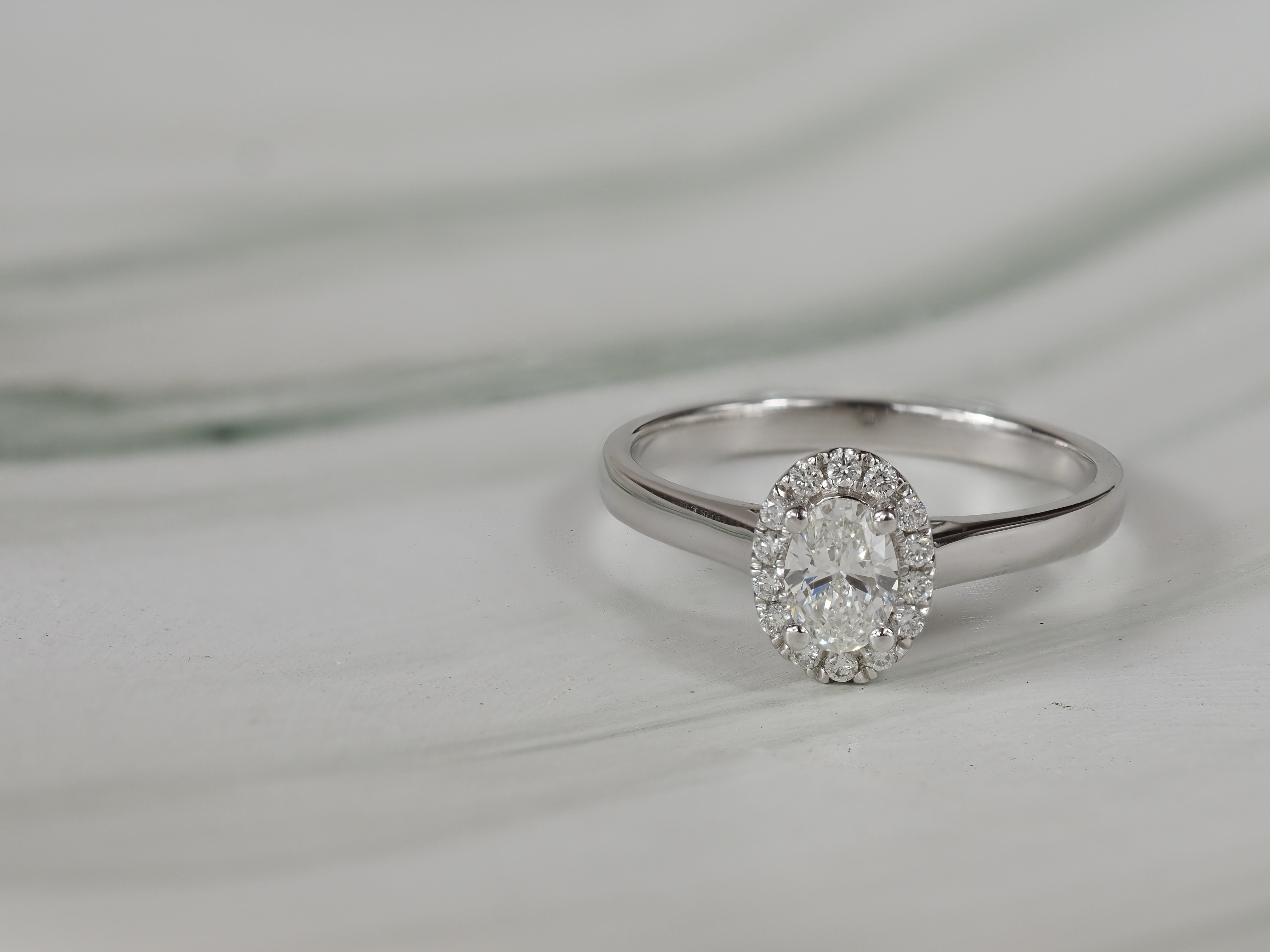 18ct White Gold Oval Cut Diamond Engagement ring, 0.40ct centre