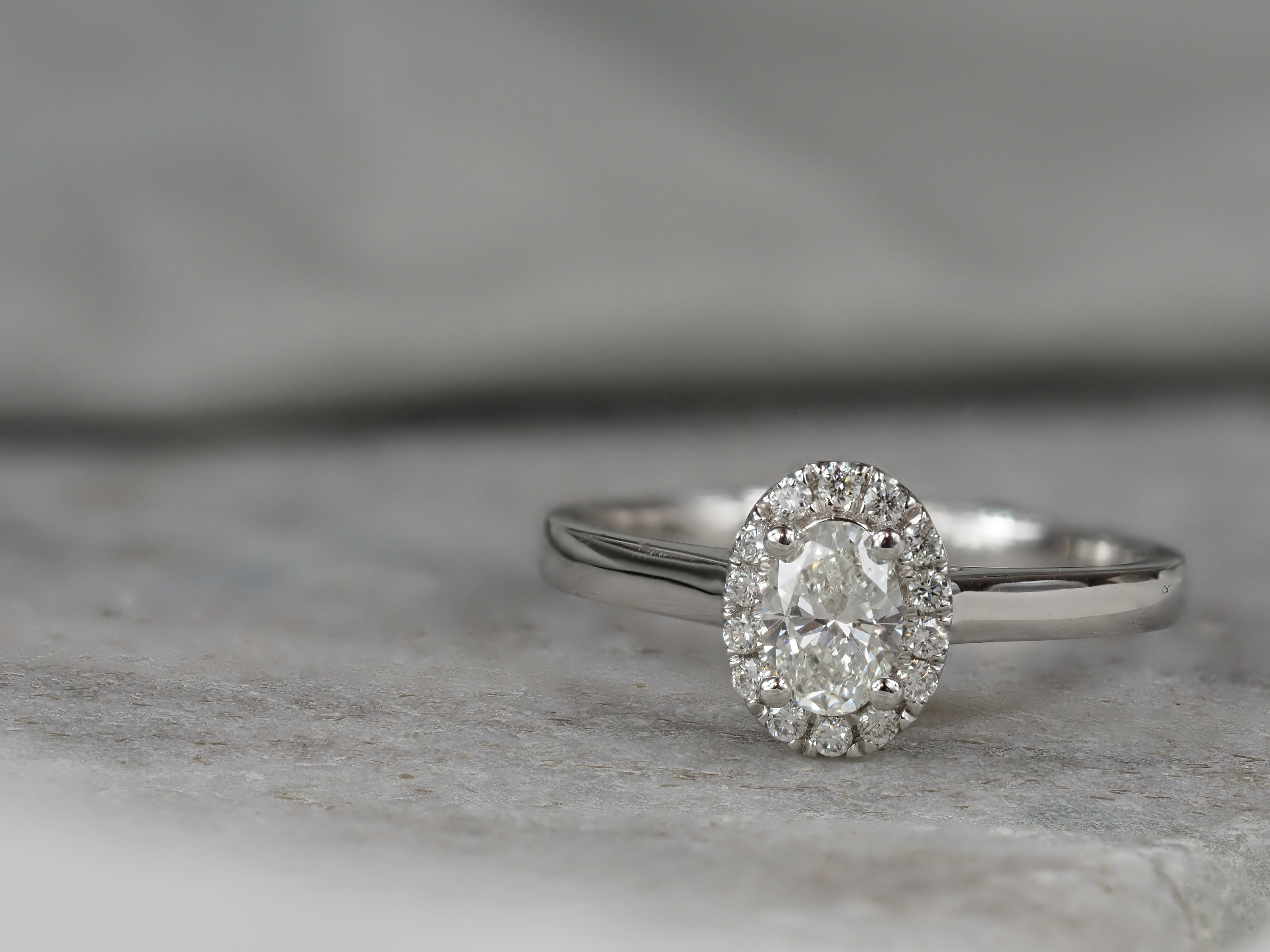 18ct White Gold Oval Cut Diamond Engagement ring, 0.40ct centre