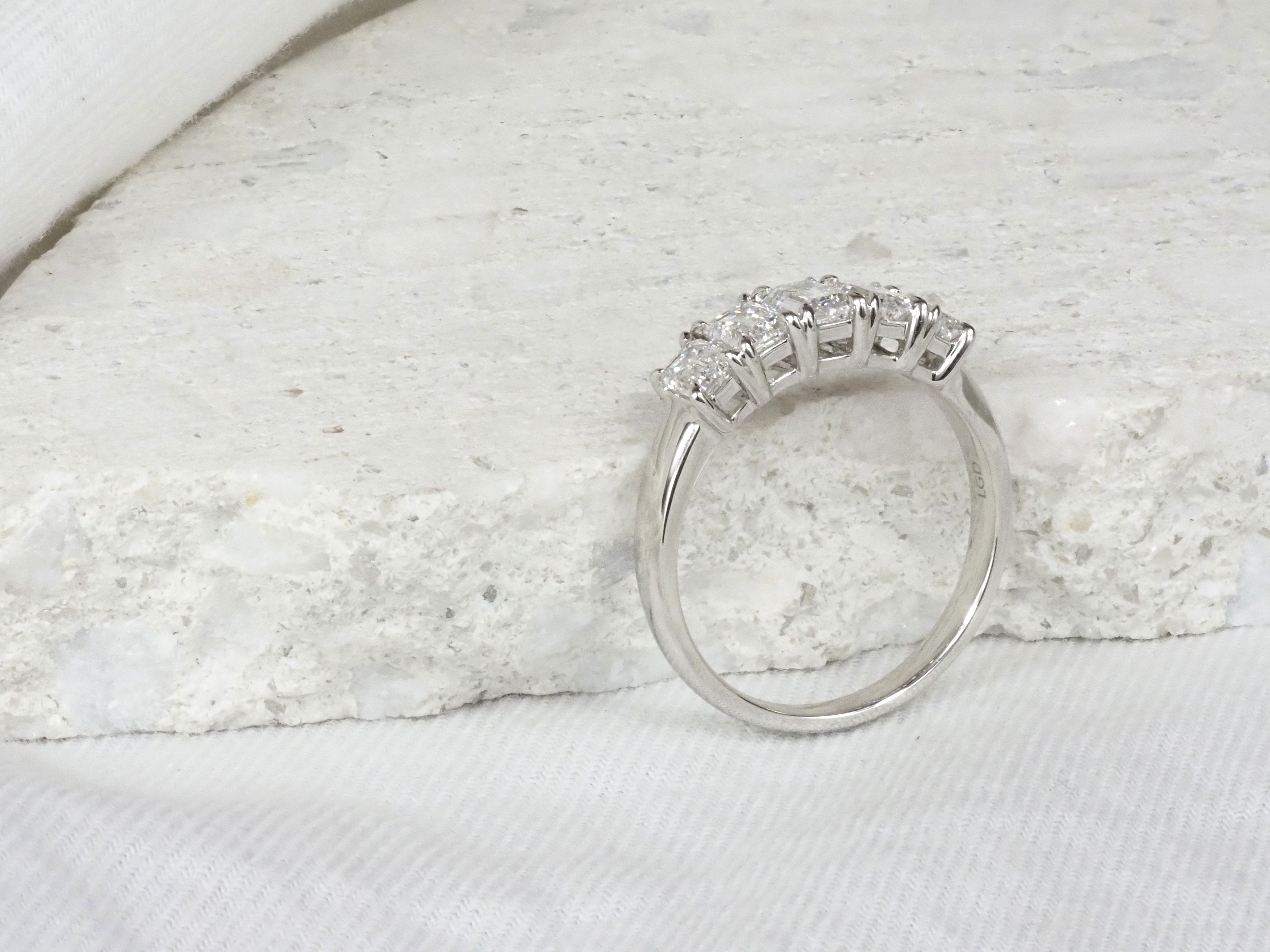 14 Carat White Gold, 5 Emerald-cut Lab-grown Ring, 1.51 carats total.