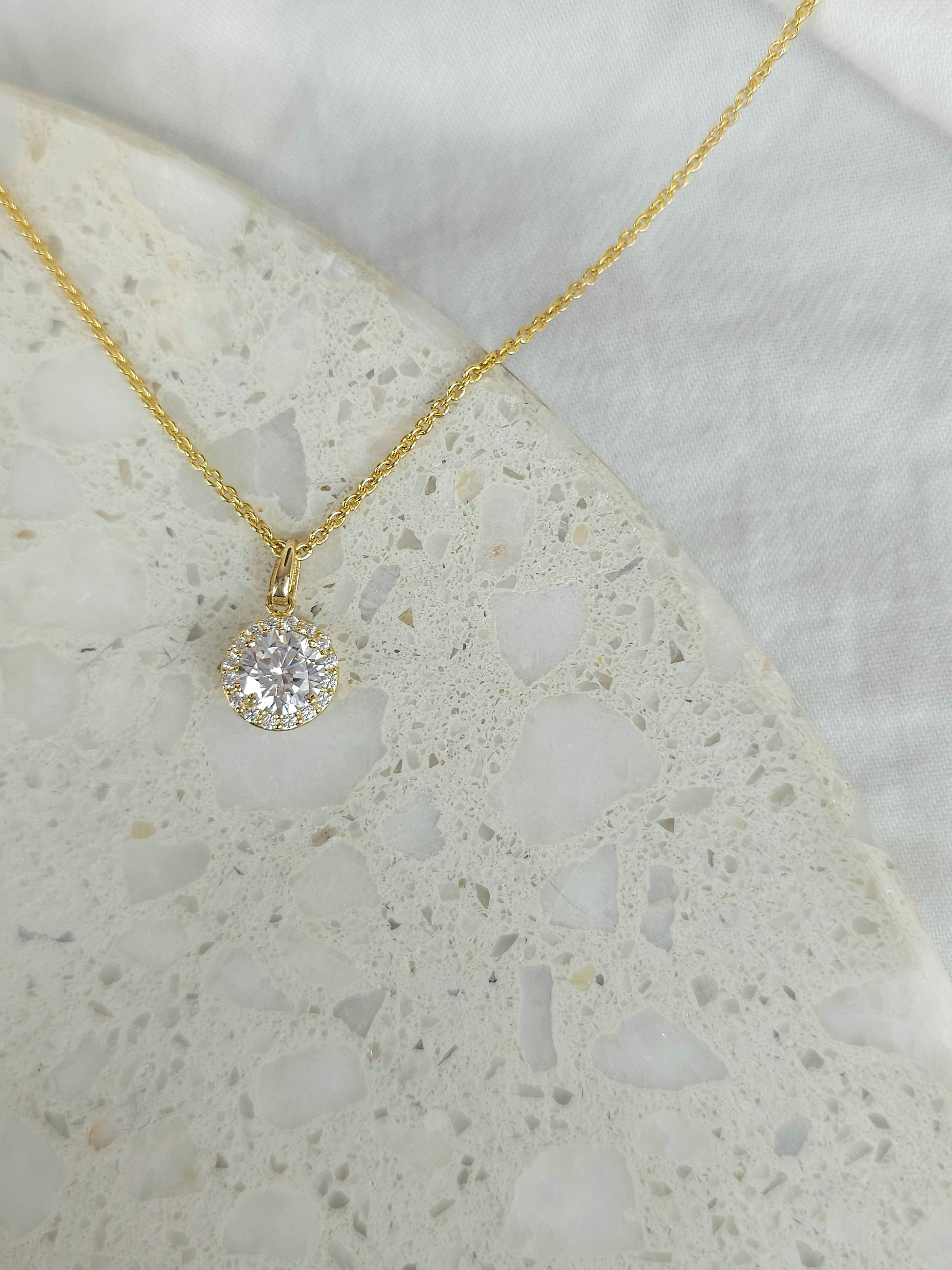 9ct gold stone set halo pendant
