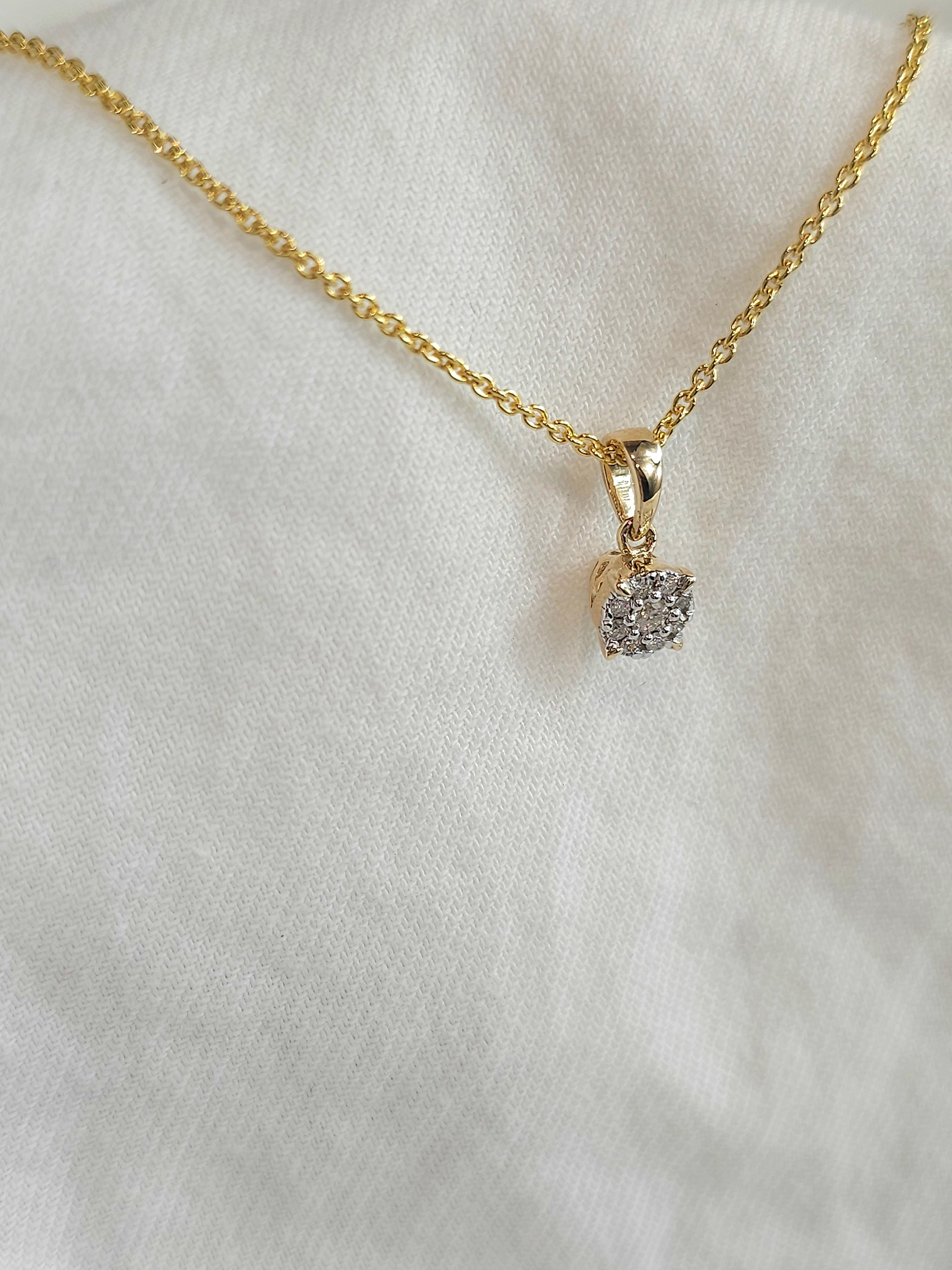 9ct 0.13ct diamond pendant