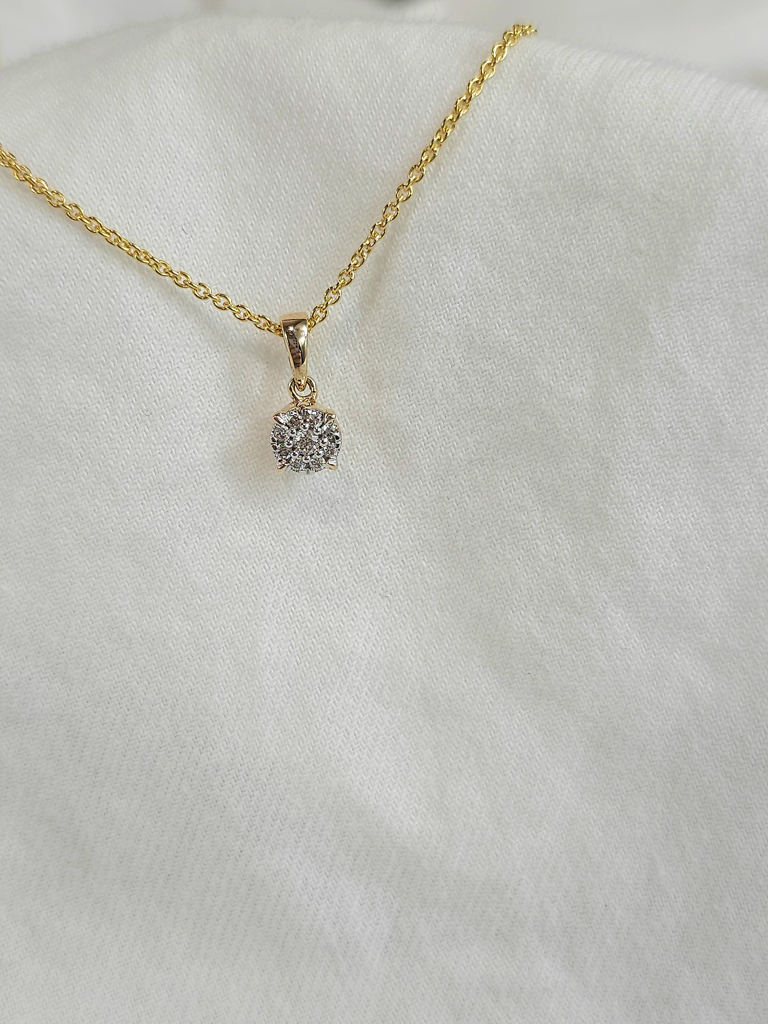 9ct 0.13ct diamond pendant