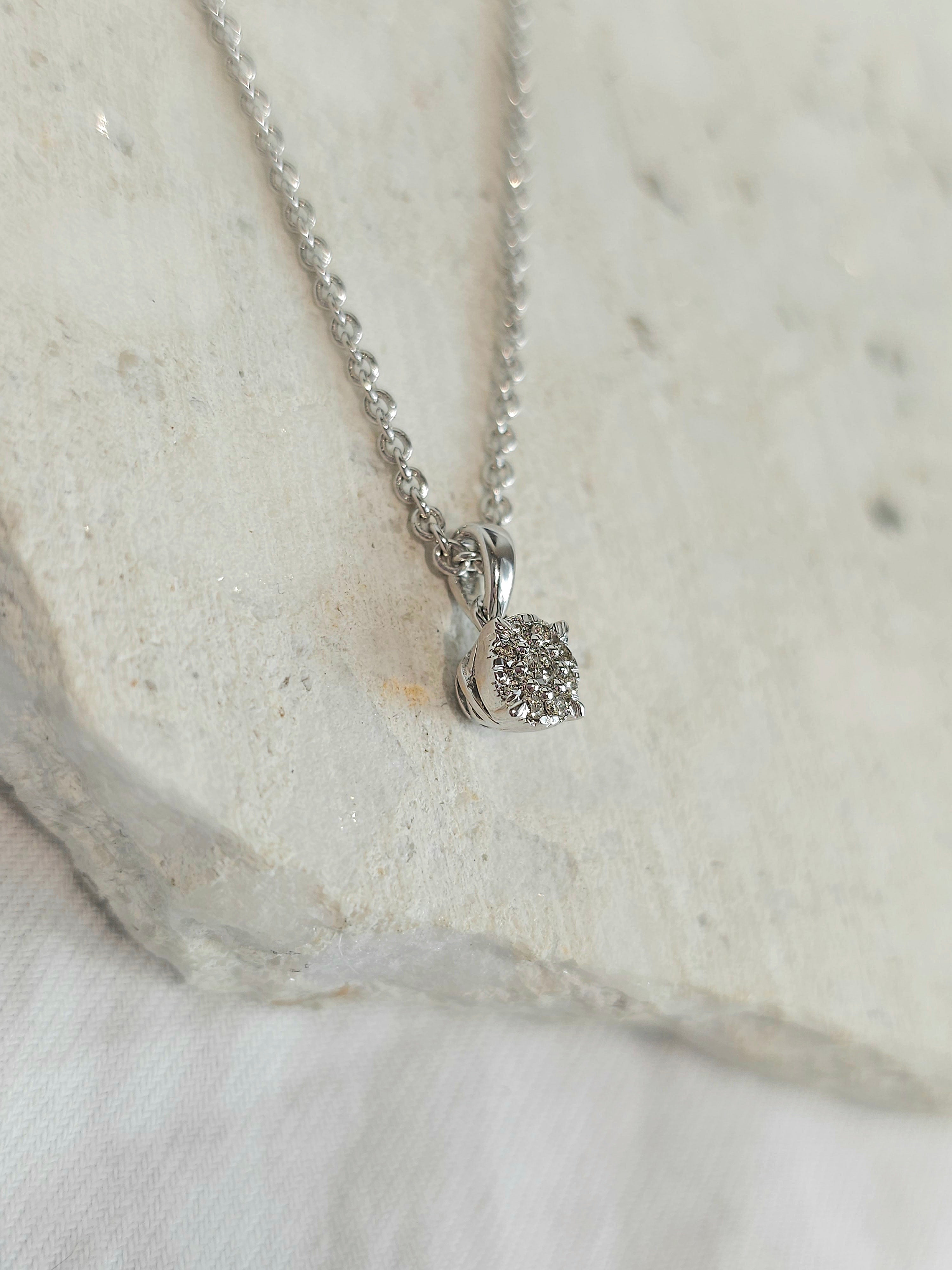 9ct white gold 0.13ct diamond pendant