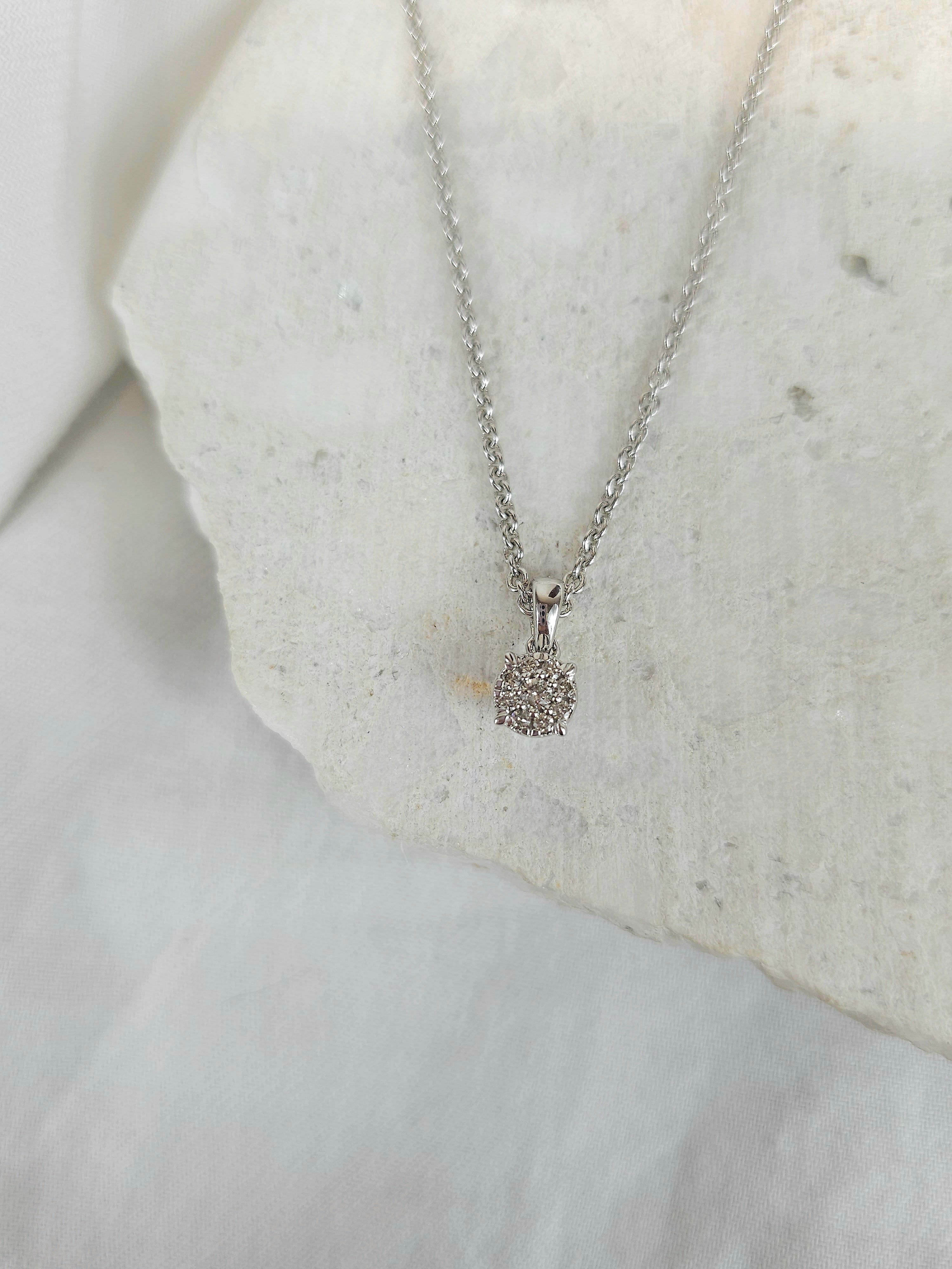 9ct white gold 0.13ct diamond pendant