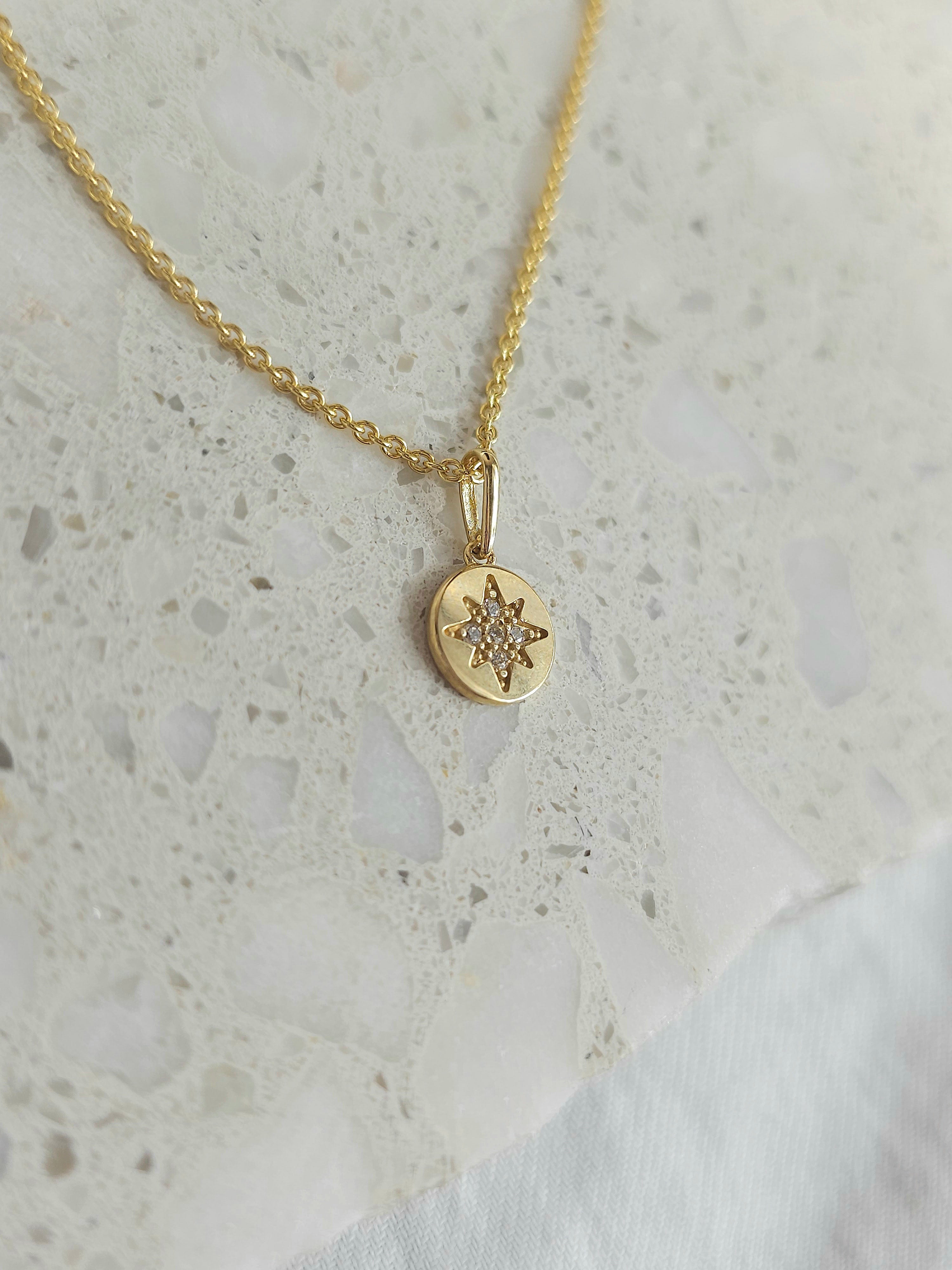9ct star set cubic zirconia  disc pendant