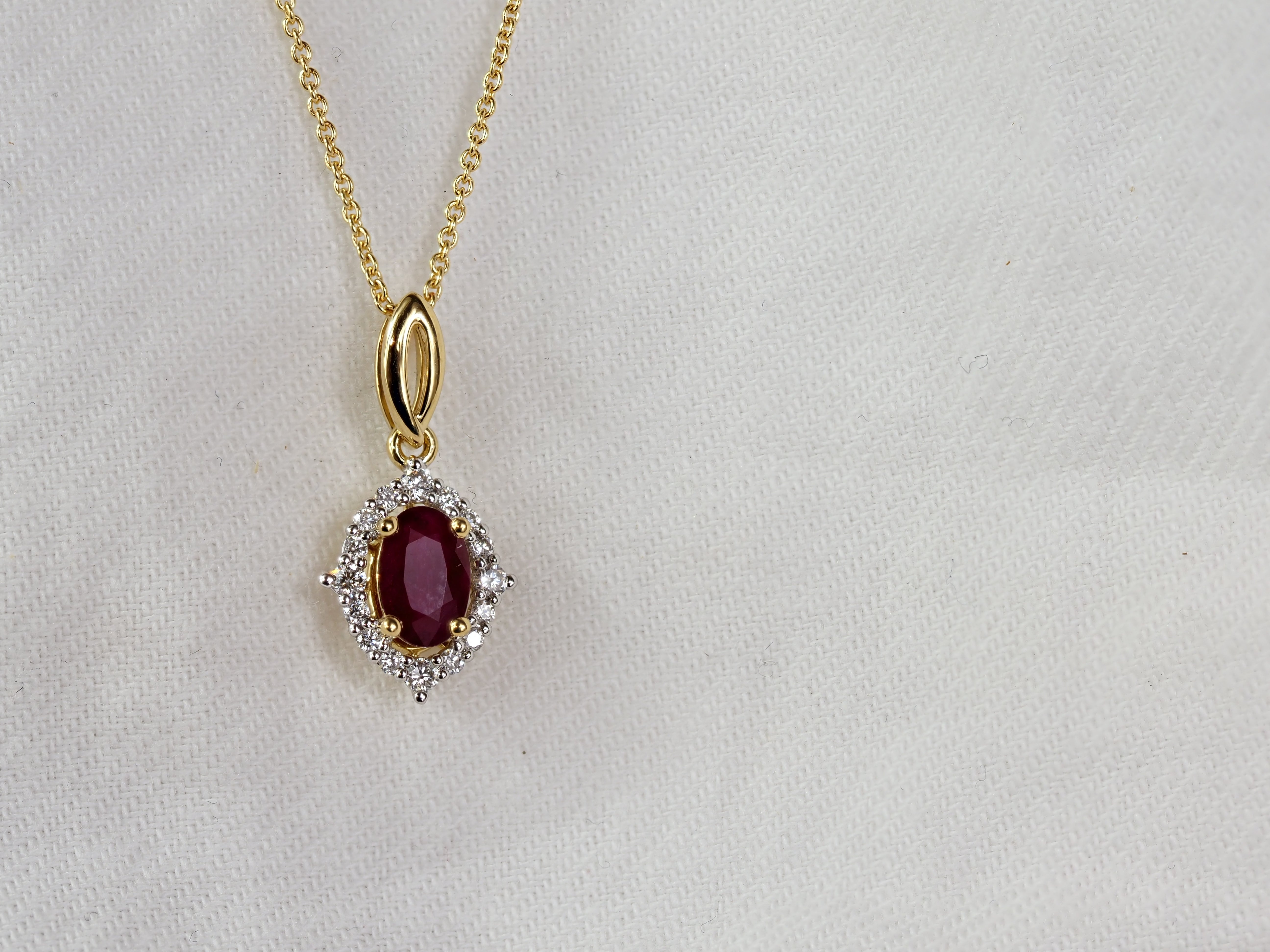 18ct Yellow and White Gold Ruby and Diamond Pendant, 0.45ct Centre