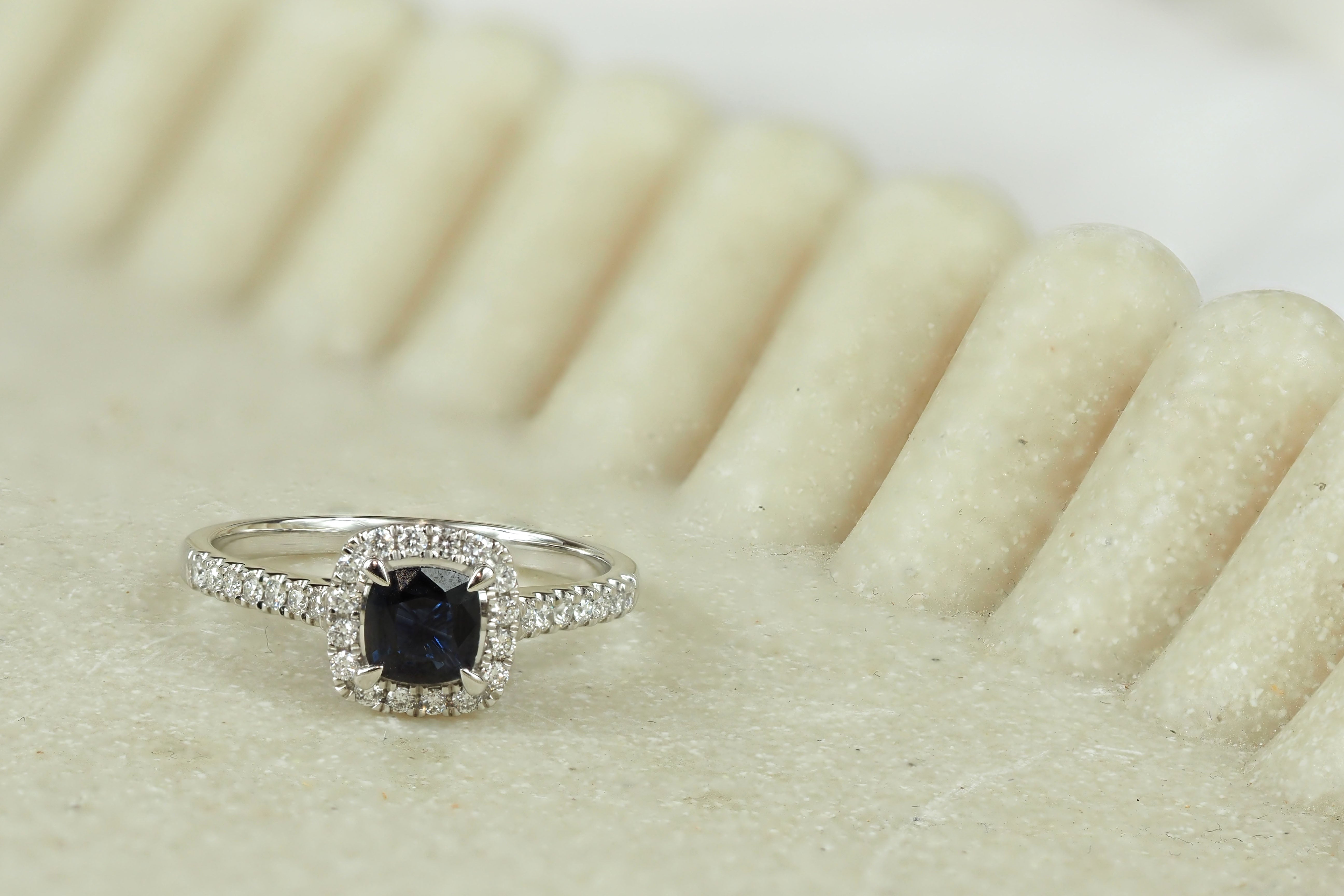 18ct White Gold Sapphire and Diamond ring, 0.56ct centre