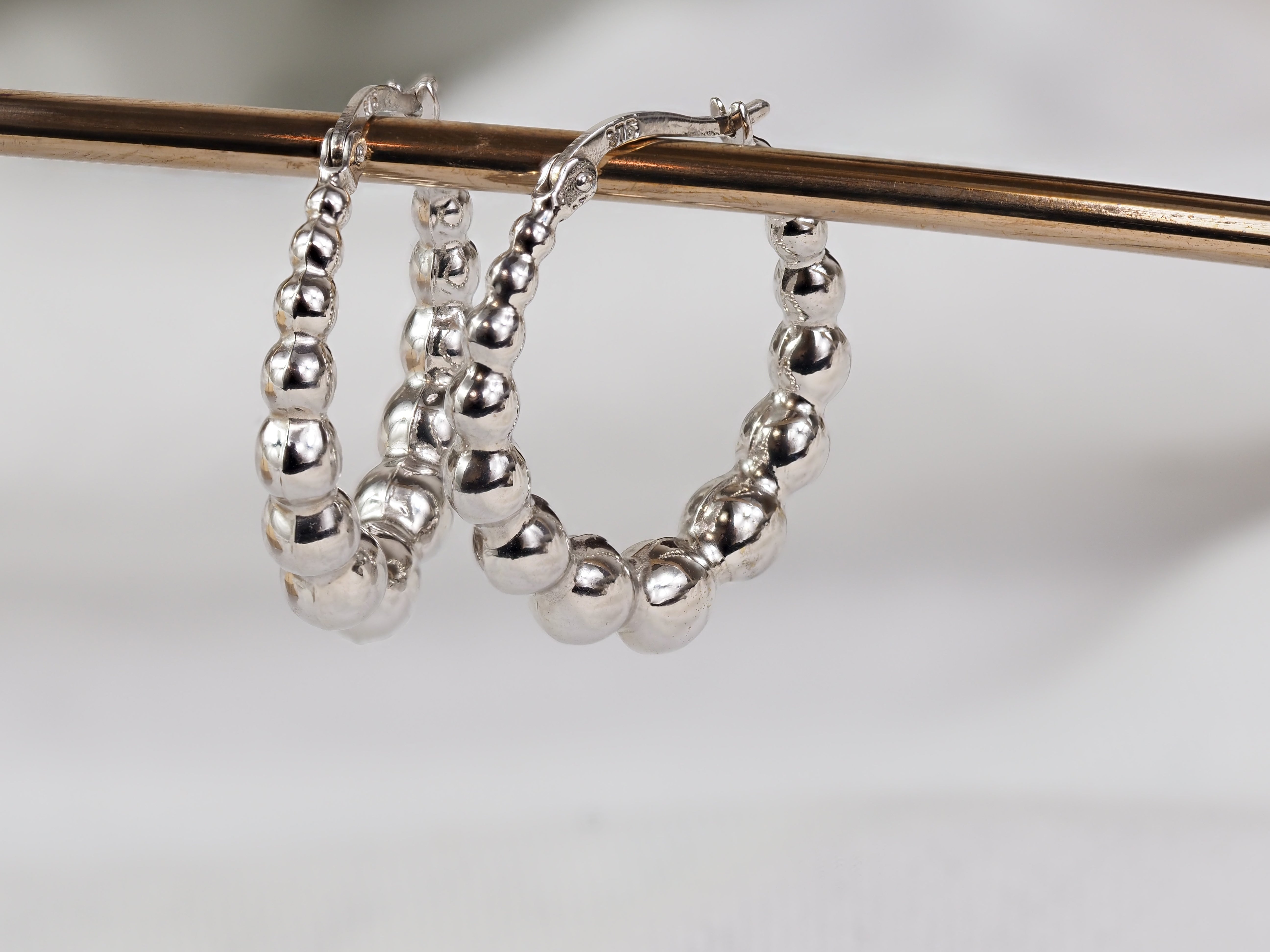 9ct White Gold Beaded Oval Huggie Earrings