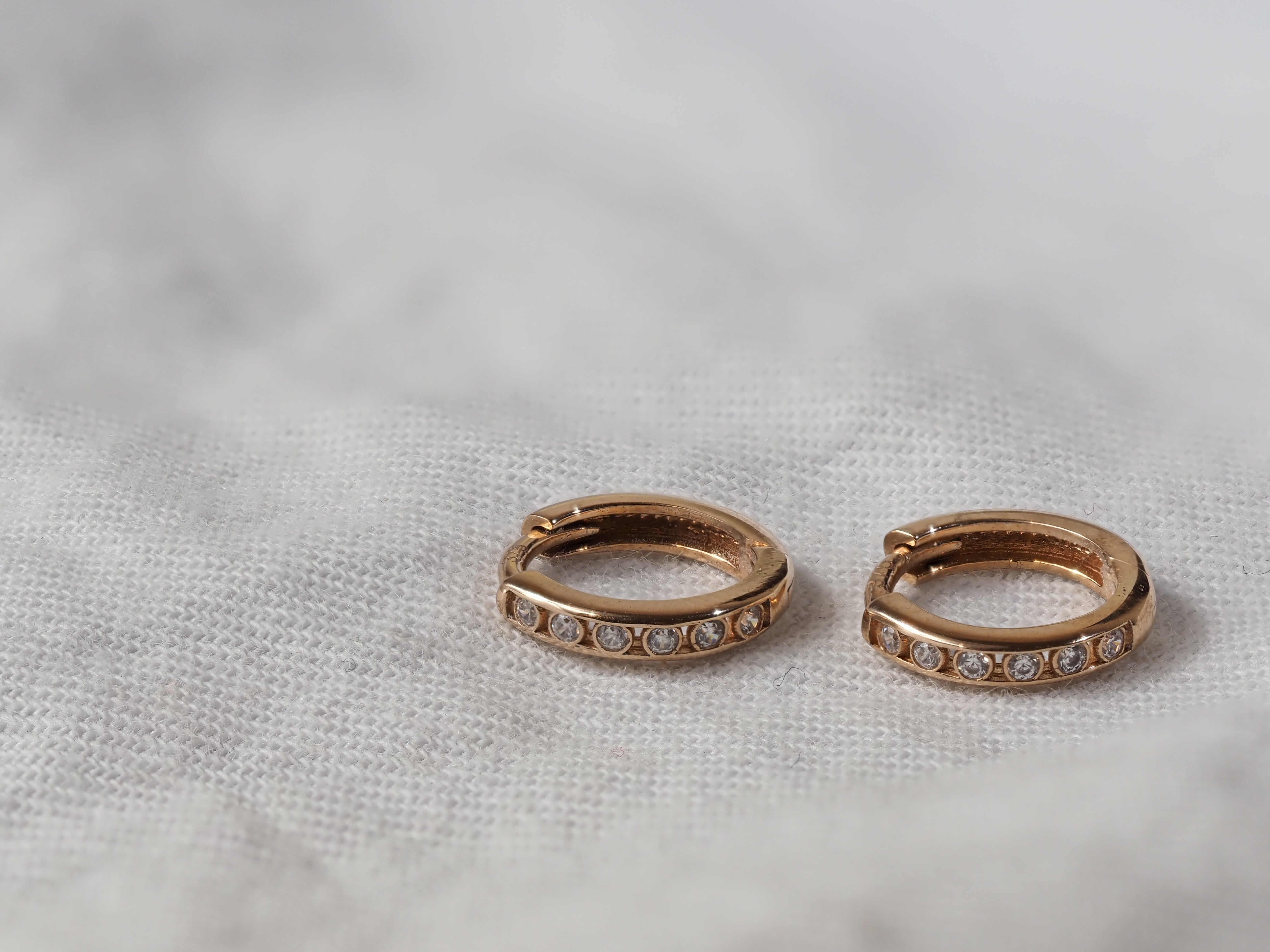 9ct Rose Gold CZ Mini Huggie earrings