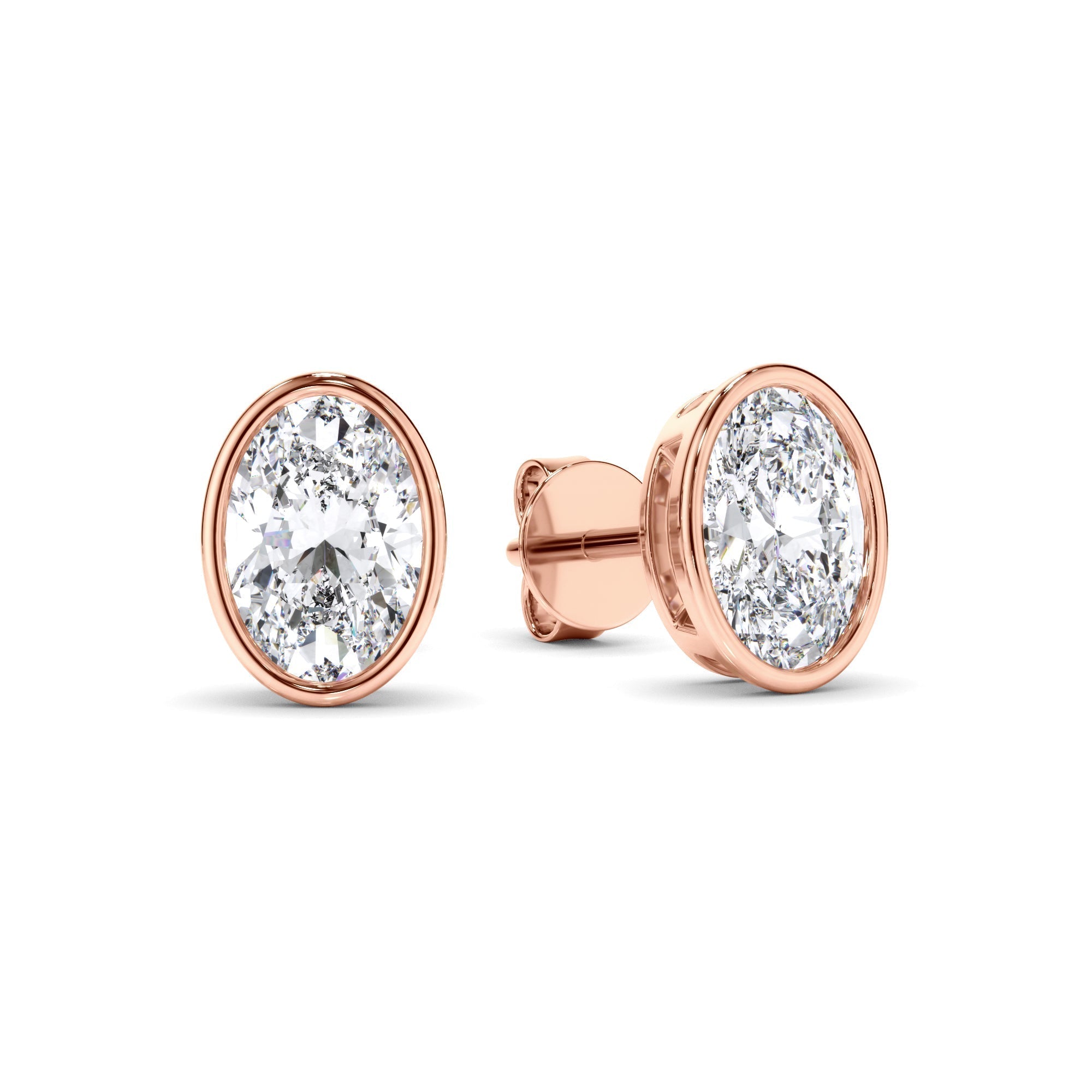 Oval Cut Diamond Bezel Set Stud Earrings