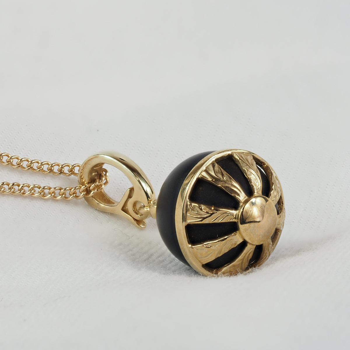9ct Yellow Gold Round Onyx and Diamond pendant