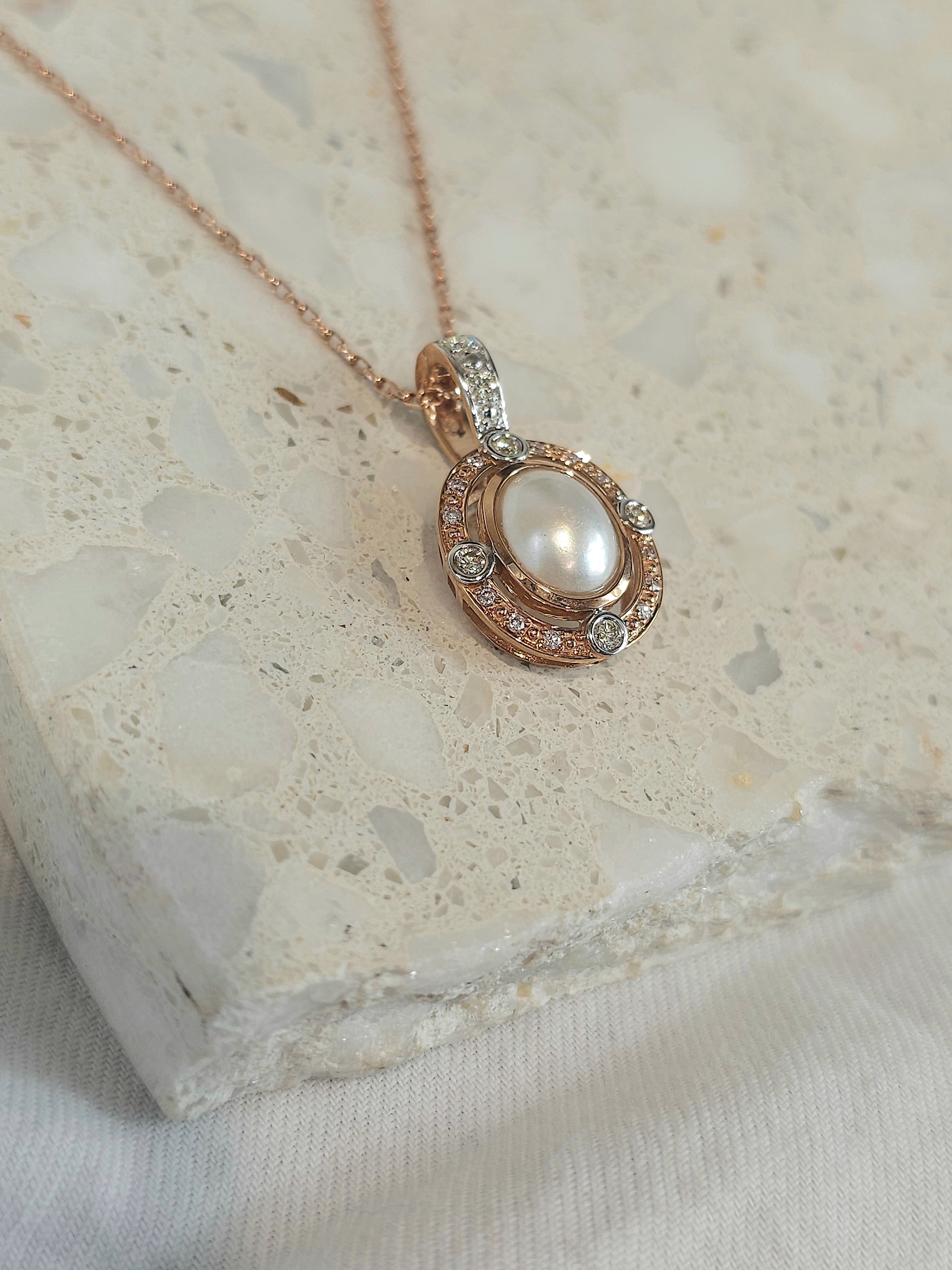9ct Rose and White 'Pink Caviar' Argyle Diamond and Mabe Pearl enhancer, 0.24cts total.