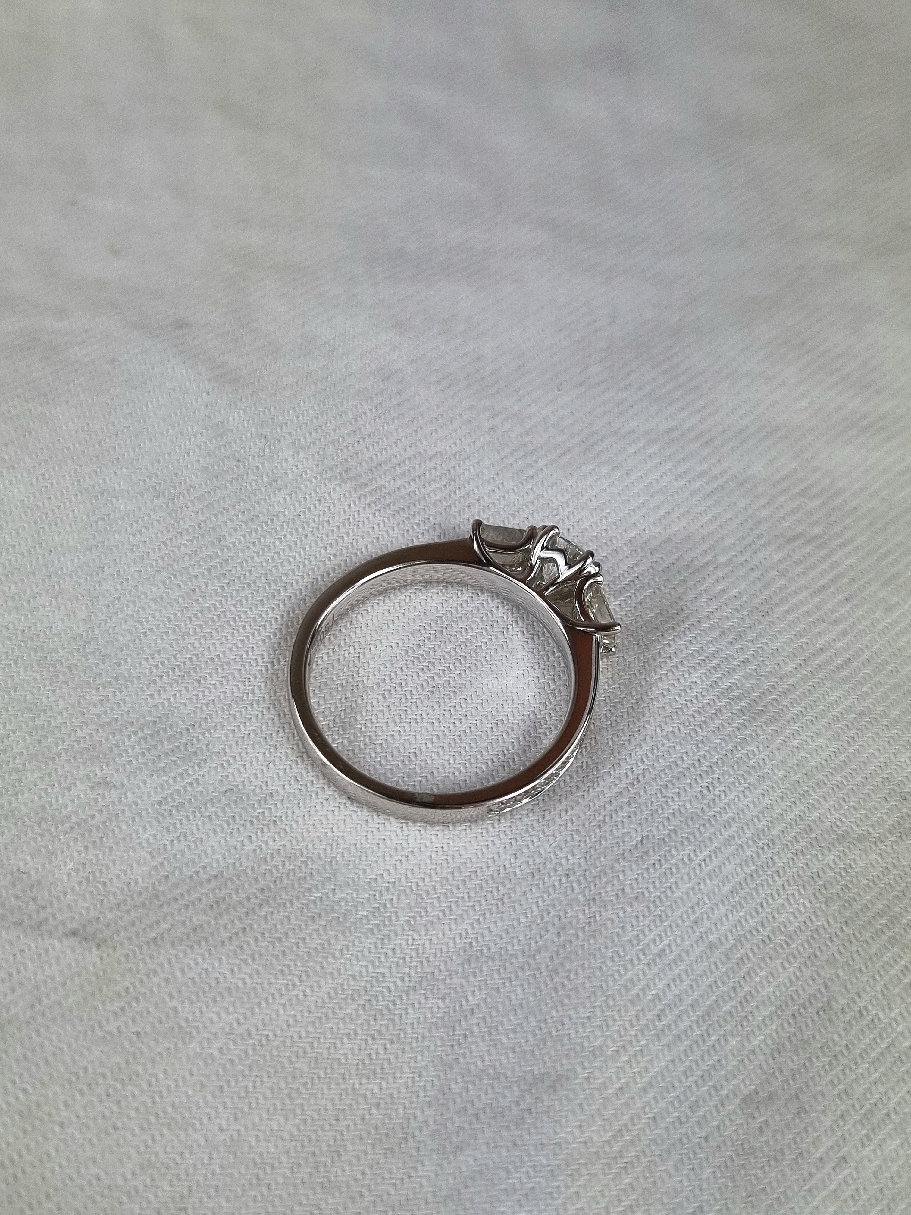 18ct White Gold Round and Emerald Cut Diamond Engagement Ring, 0.40ct Centre