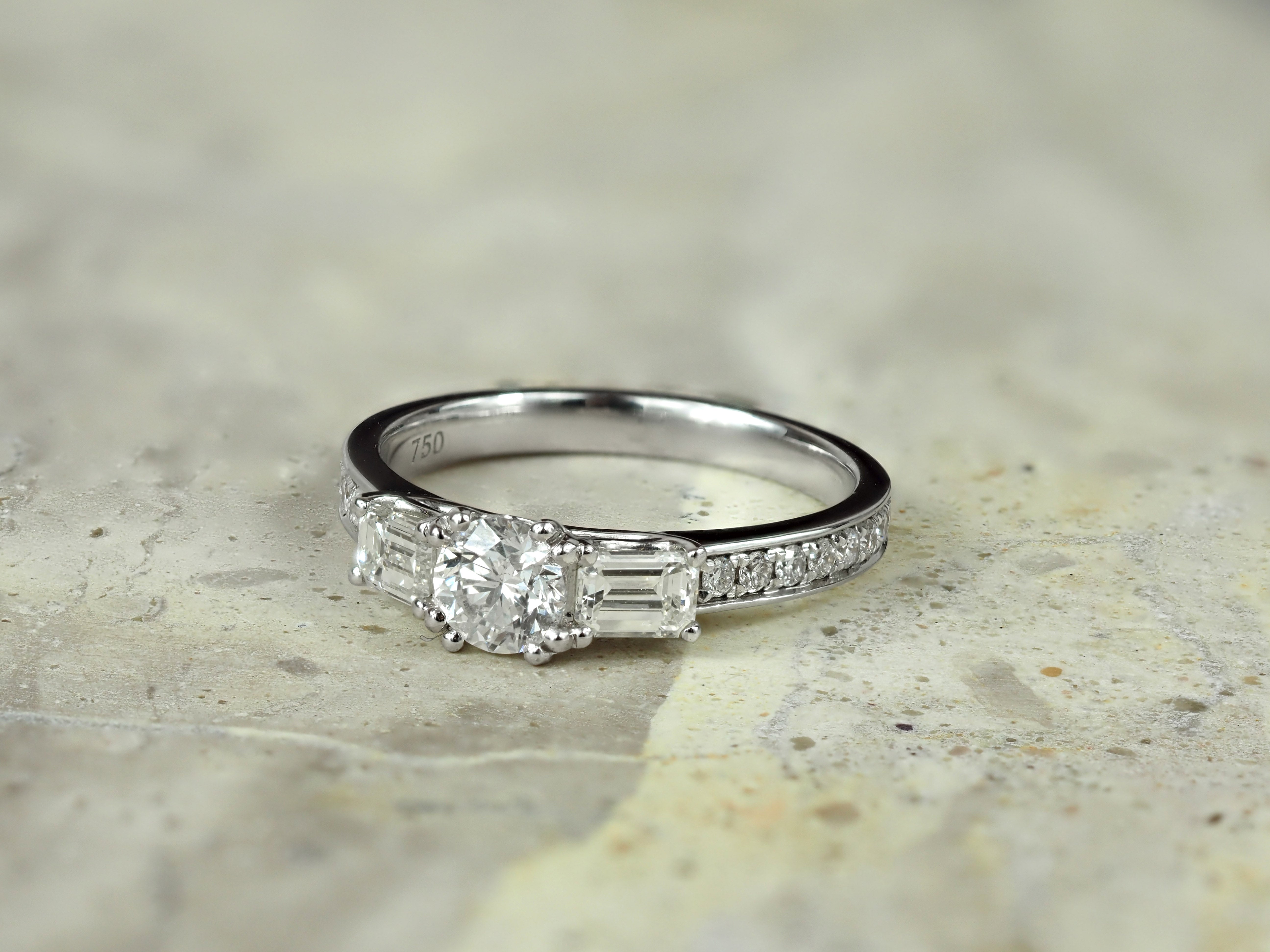 18ct White Gold Round and Emerald Cut Diamond Engagement Ring, 0.40ct Centre