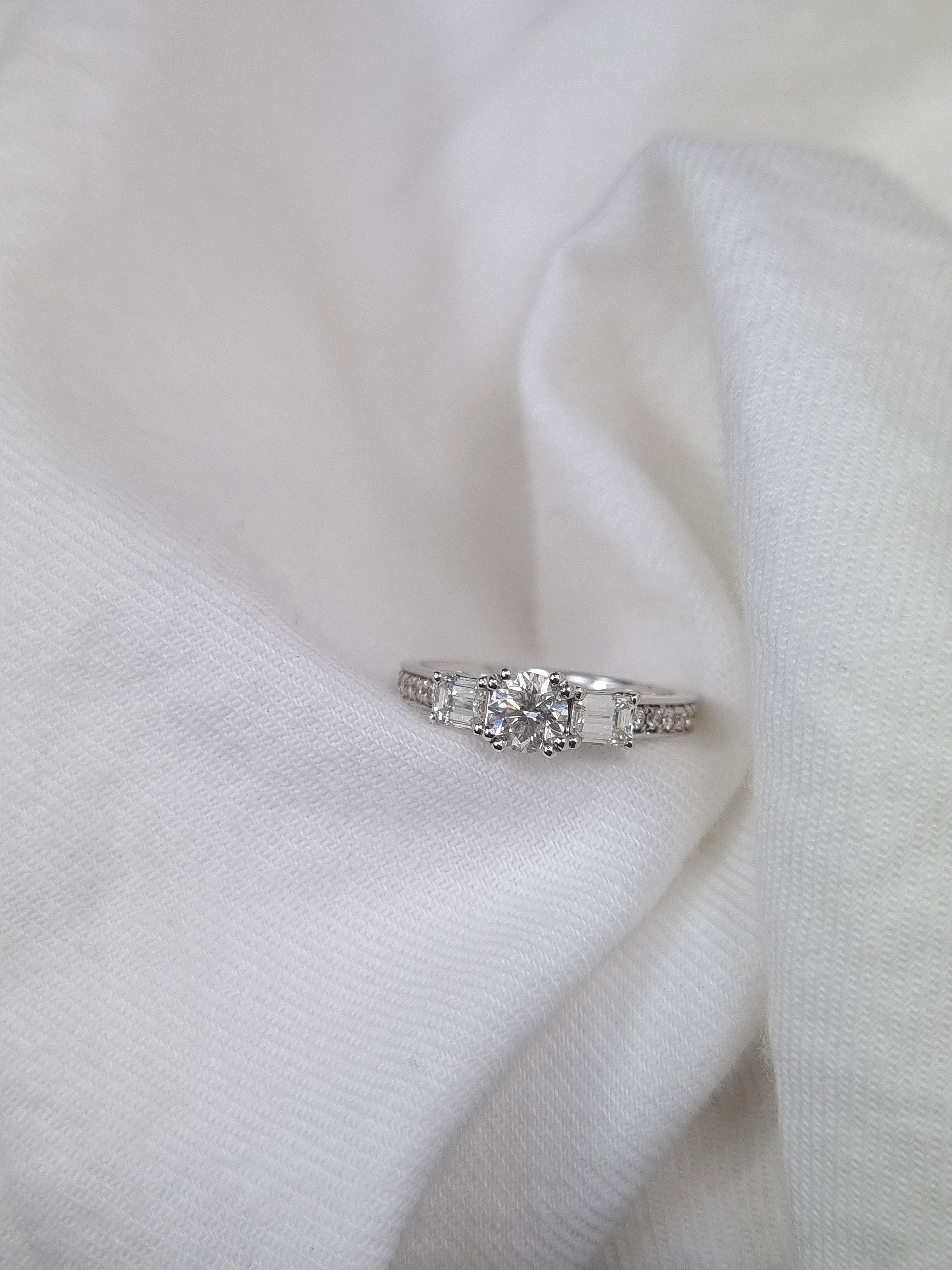 18ct White Gold Round and Emerald Cut Diamond Engagement Ring, 0.40ct Centre