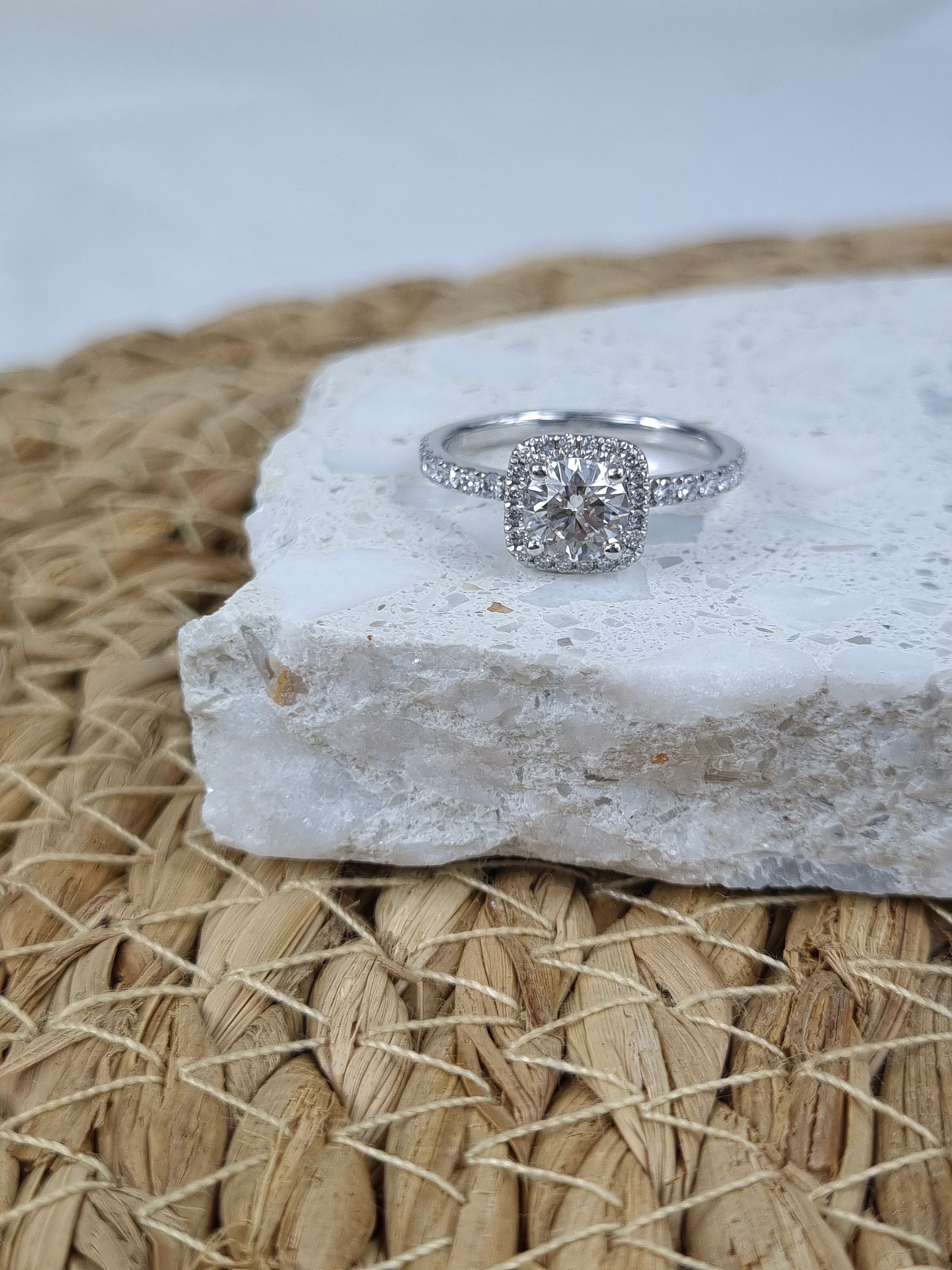 18ct White Gold Round Brilliant Cut Cushion-Halo Ring, 0.75 carat centre.