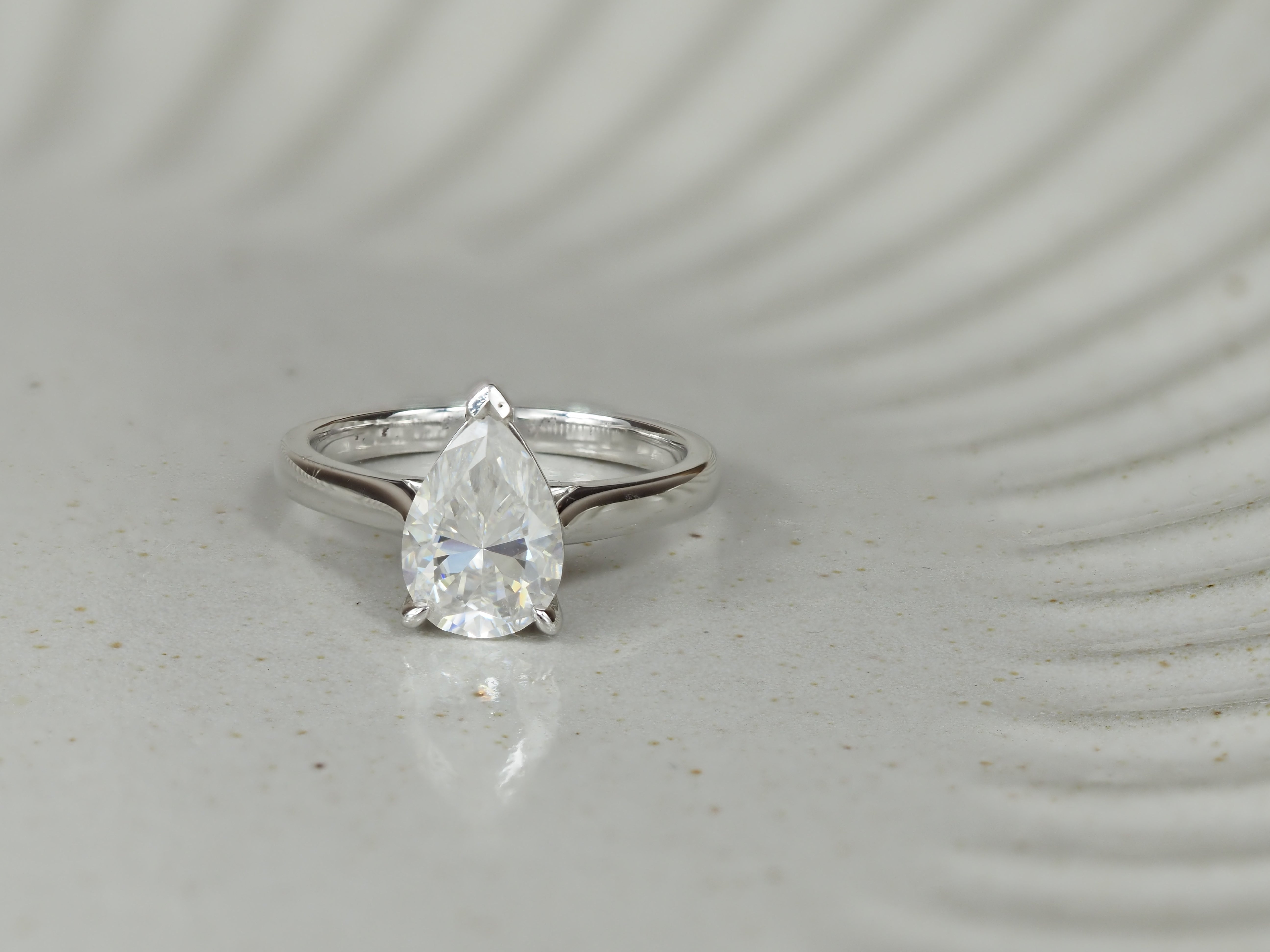 9ct White Gold Moissanite Pear Solitaire.