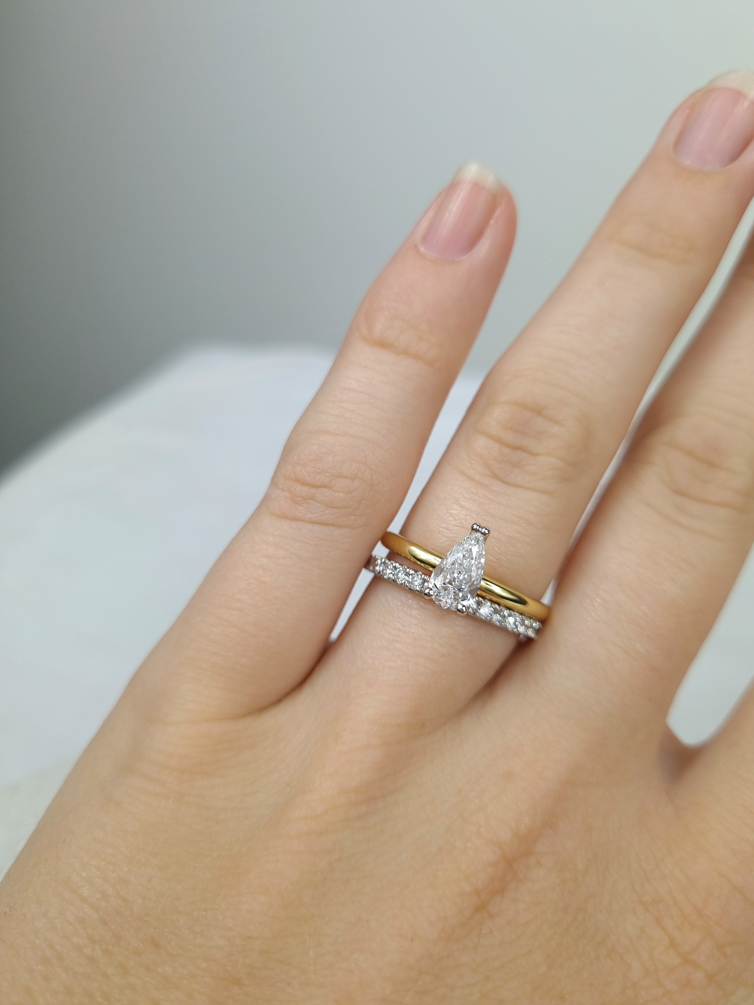 18ct Yellow and White gold Pear engagement ring, 0.71ct centre