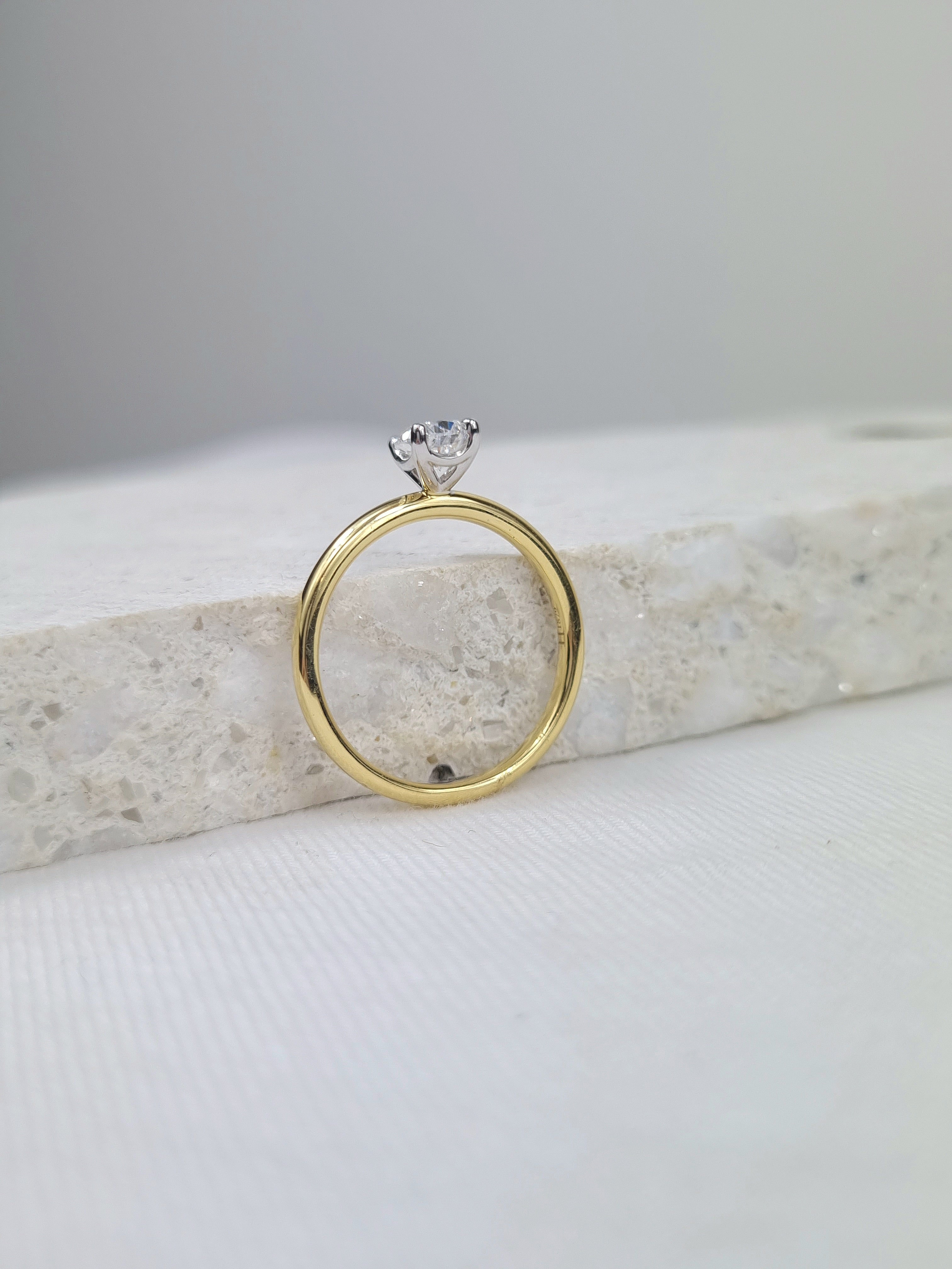 18ct Yellow and White gold Pear engagement ring, 0.71ct centre