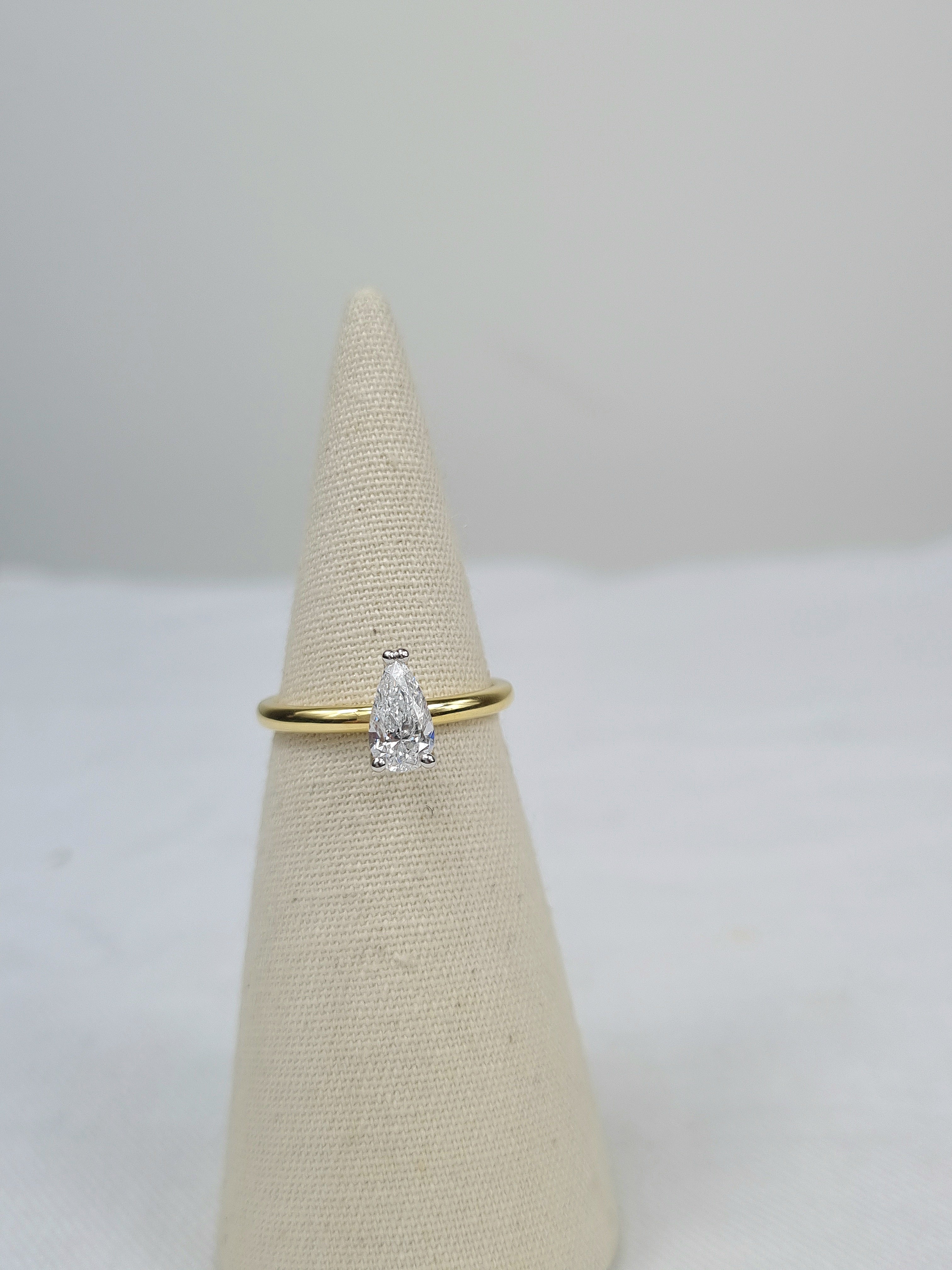 18ct Yellow and White gold Pear engagement ring, 0.71ct centre