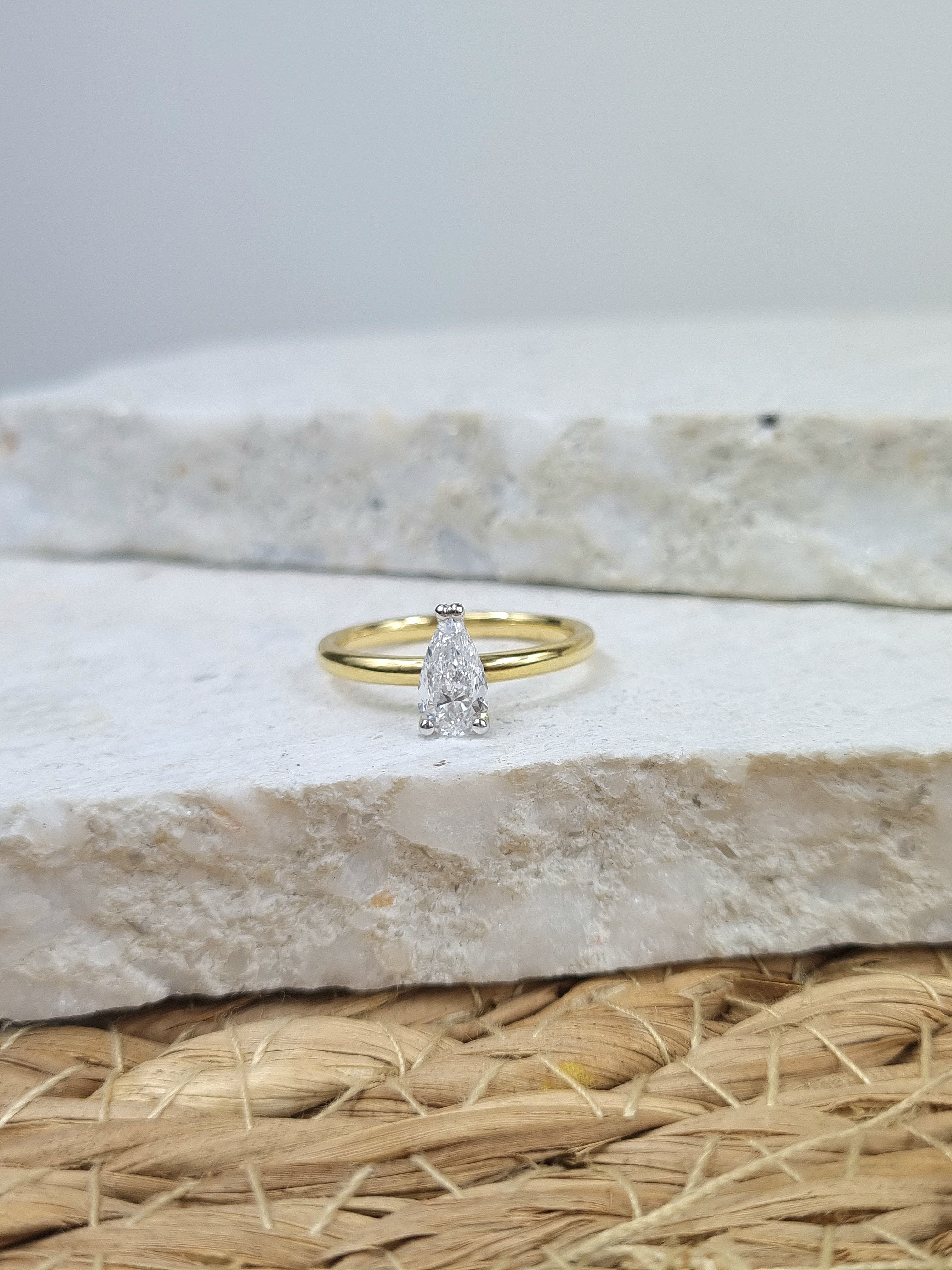 18ct Yellow and White gold Pear engagement ring, 0.71ct centre