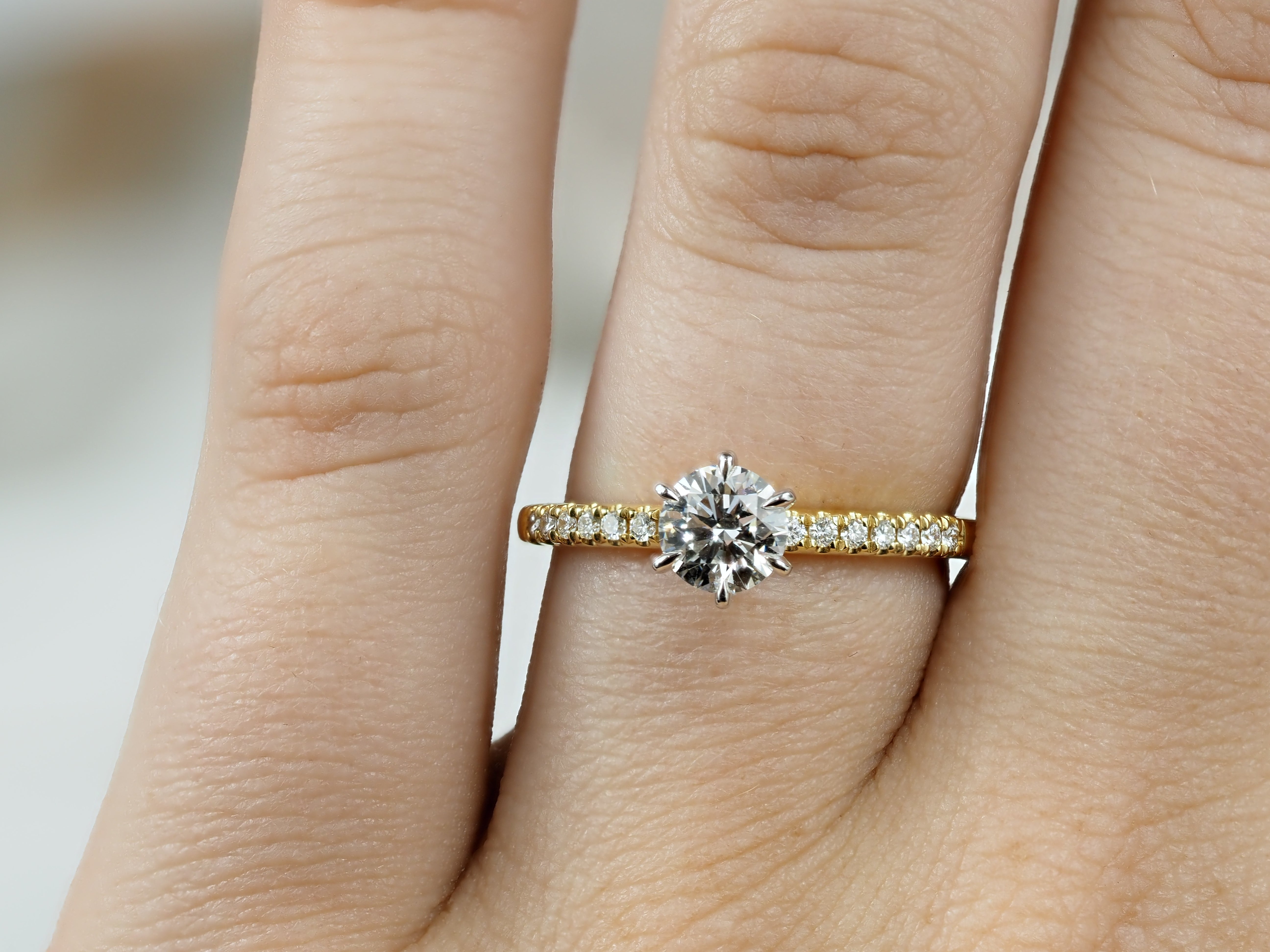 18ct Yellow and White Gold Round Brillant Cut Diamond Engagement Ring, 0.59ct Centre