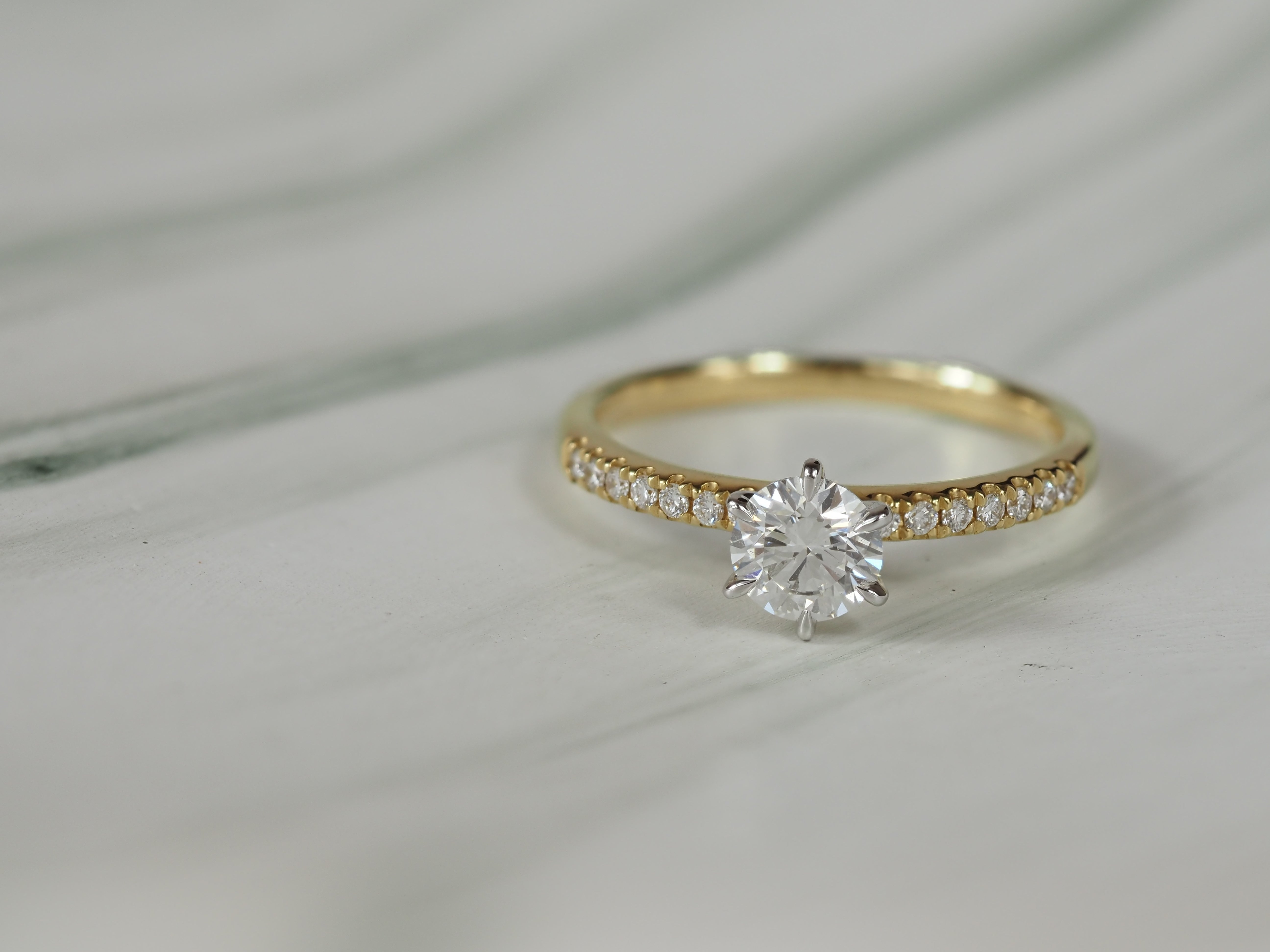 18ct Yellow and White Gold Round Brillant Cut Diamond Engagement Ring, 0.59ct Centre