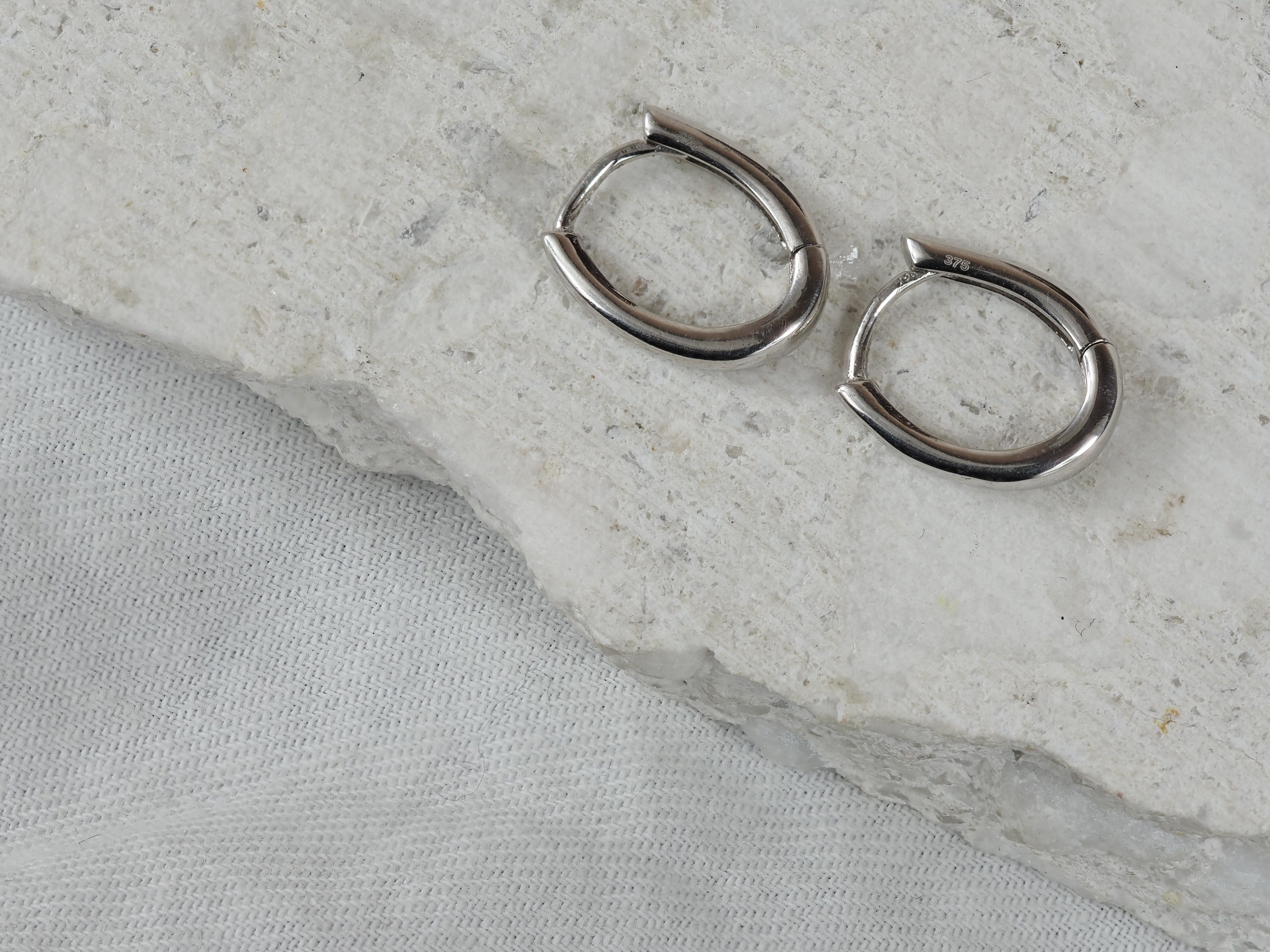 9ct White Gold Oval Huggie Earrings