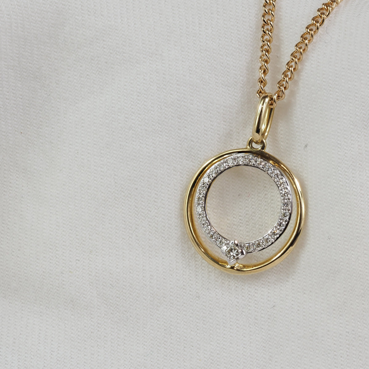 9ct Yellow and White Gold Open Circle Diamond Pendant, 0.161ct total