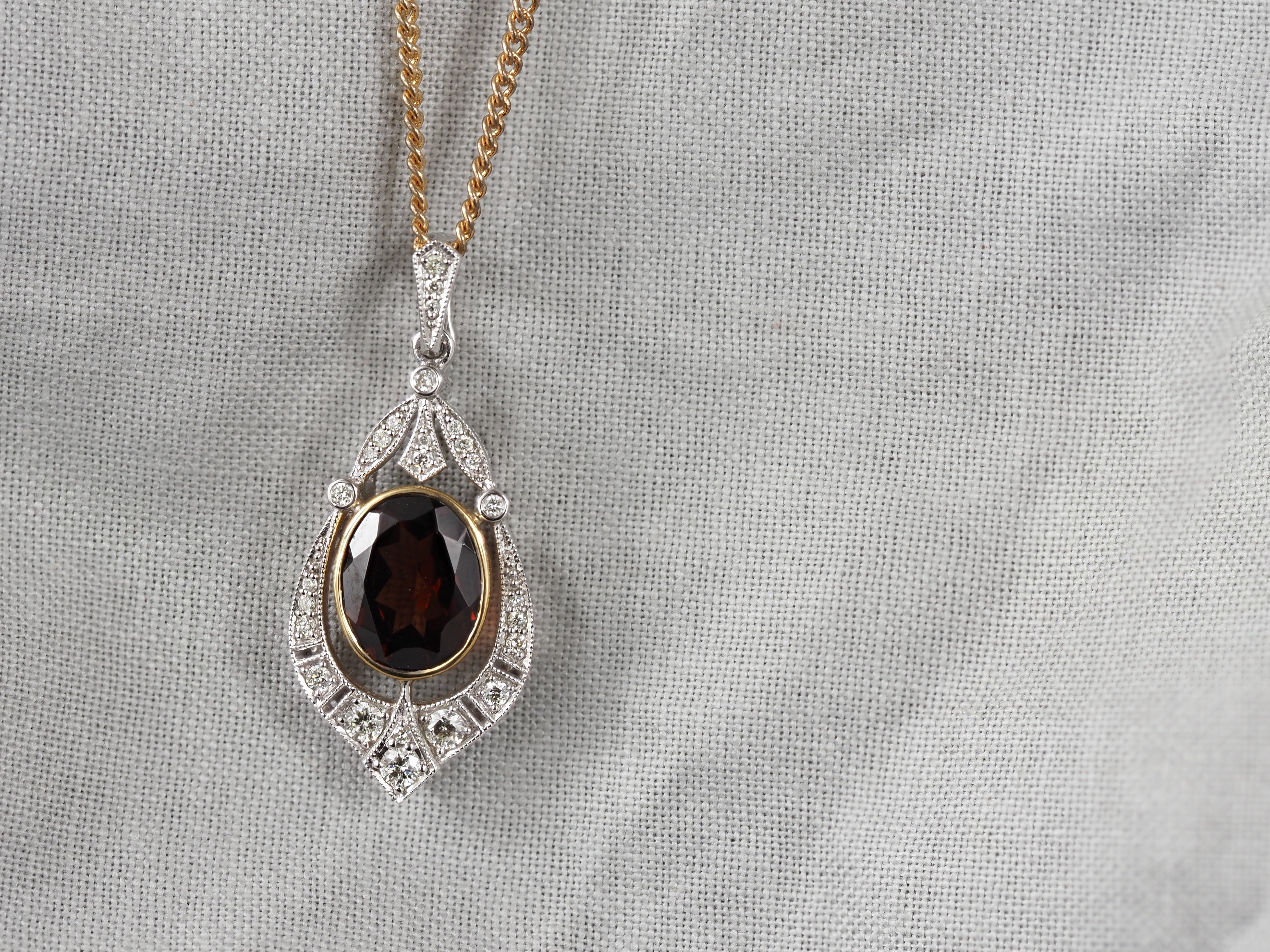 9ct Yellow and White Gold Garnet and Diamond pendant