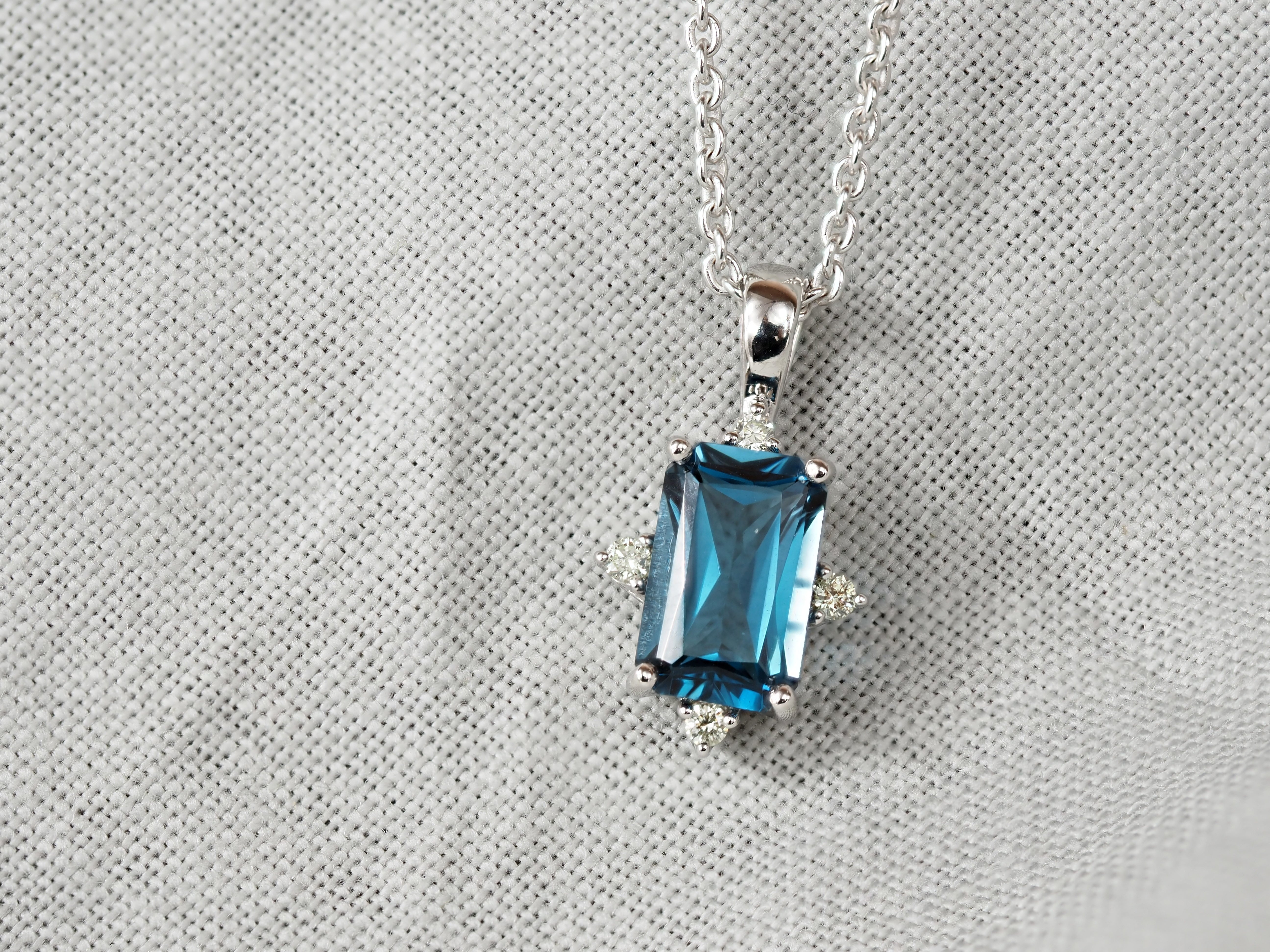 9ct White Gold London Blue Topaz and Diamond Pendant
