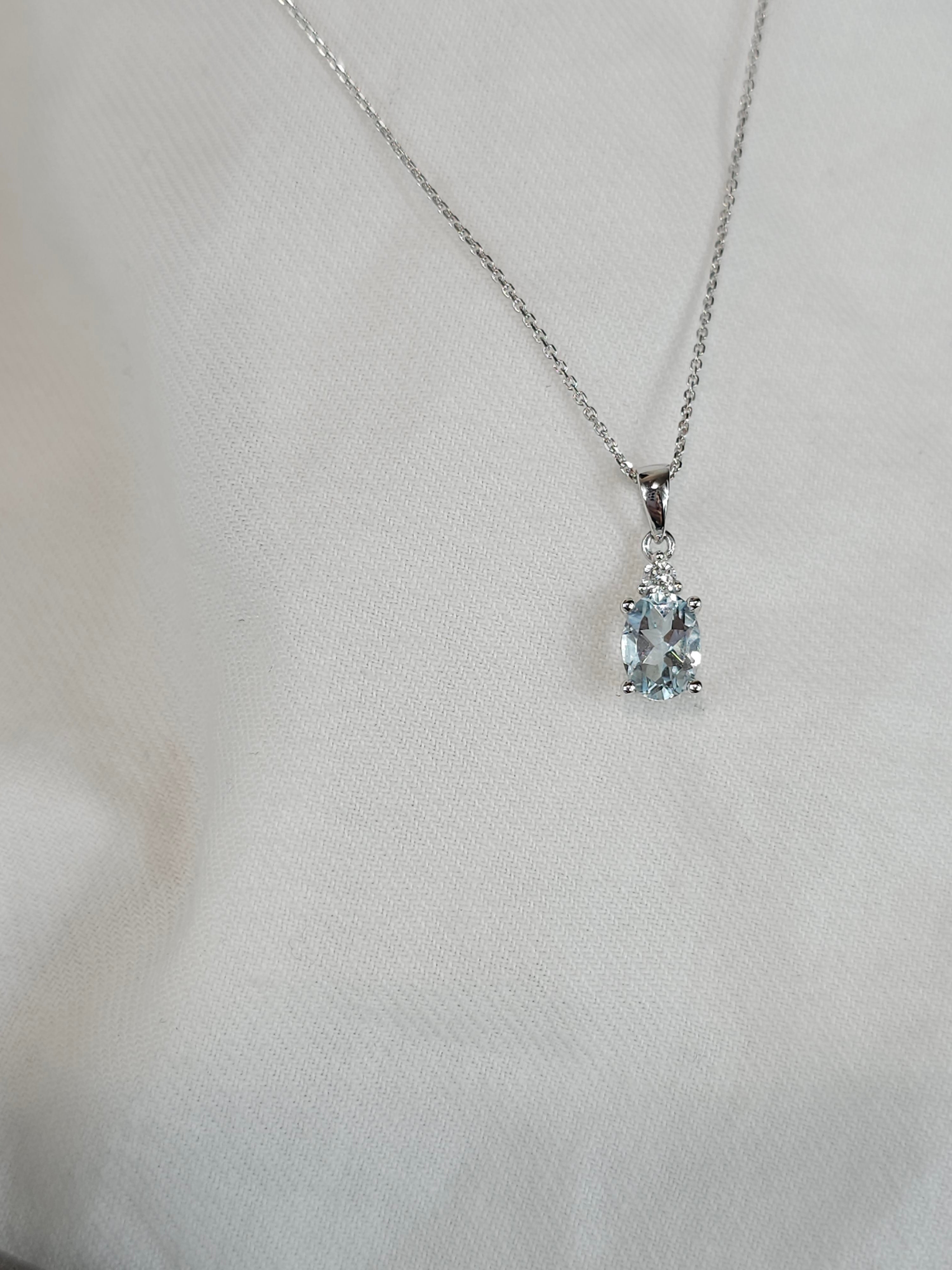 9ct white gold aquamarine & diamond pendant