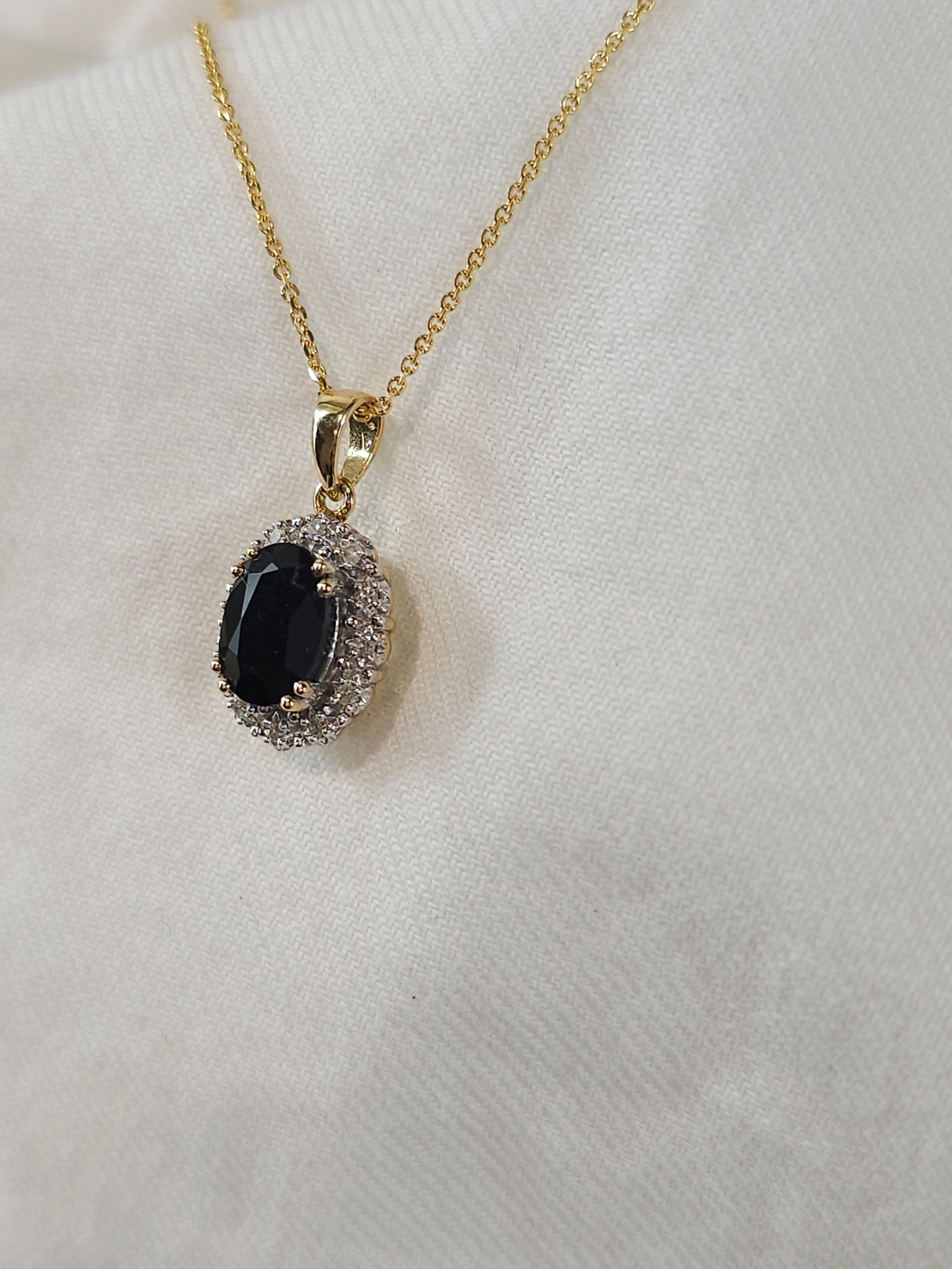 9ct gold sapphire & diamond pendant