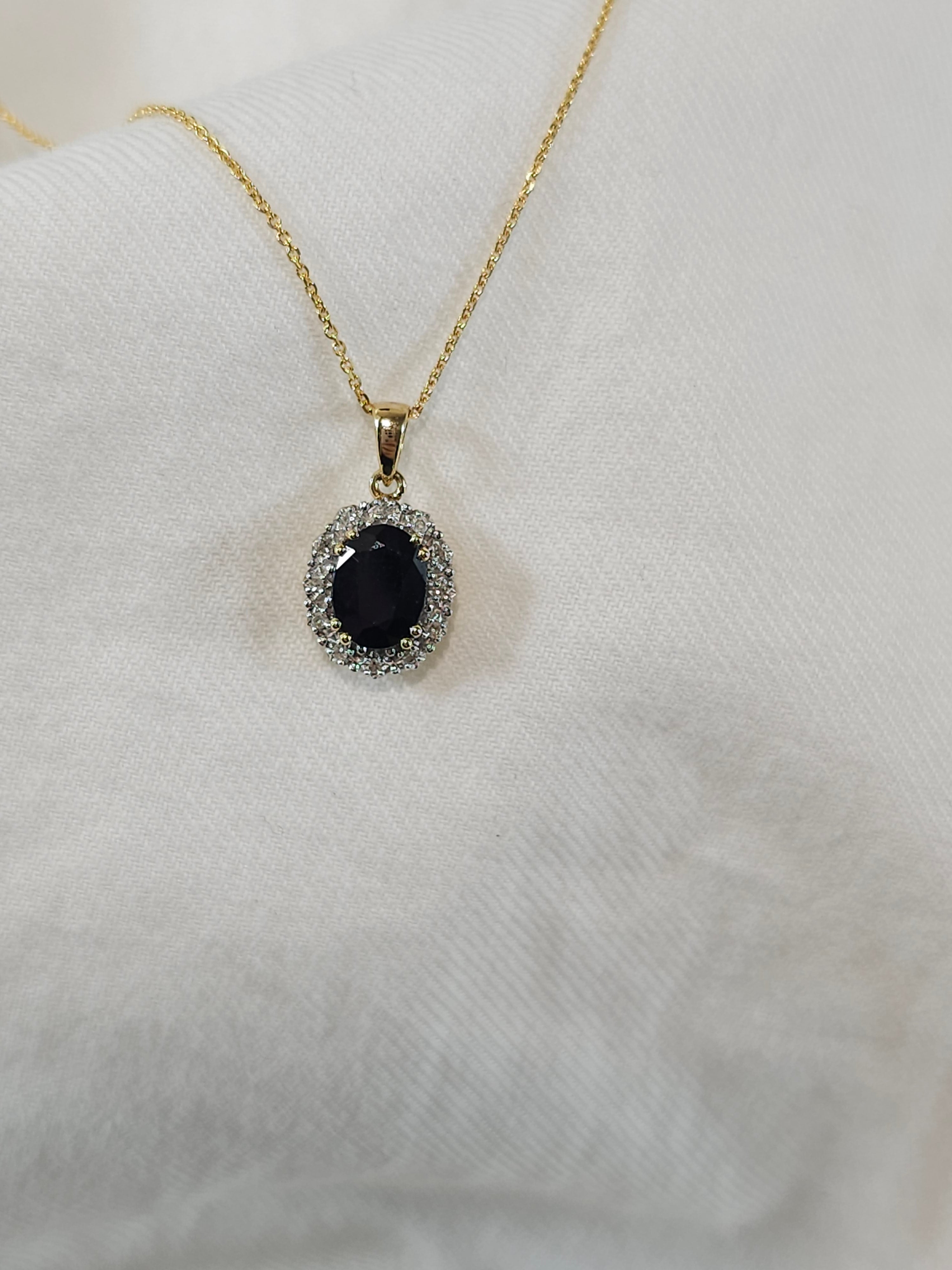9ct gold sapphire & diamond pendant