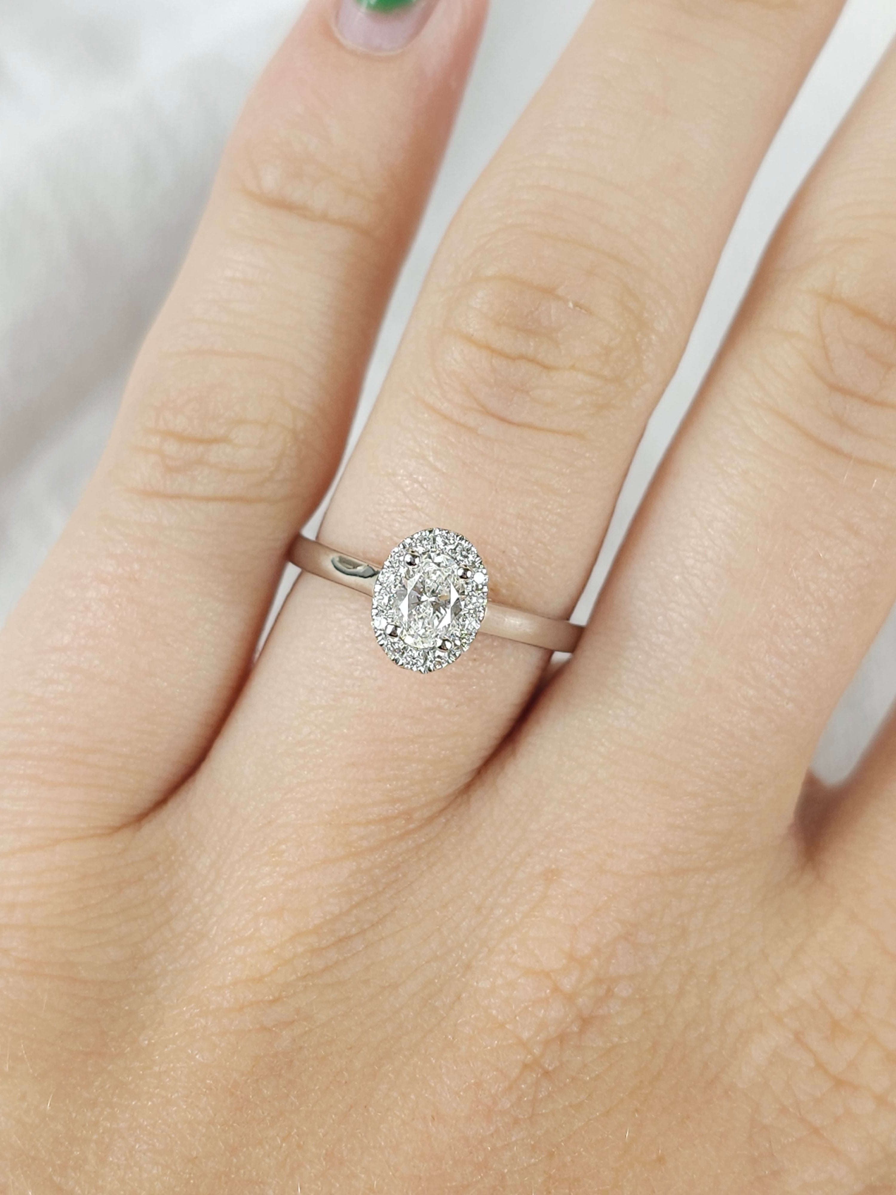 18ct White Gold Oval Cut Diamond Halo Engagement ring, 0.40ct centre