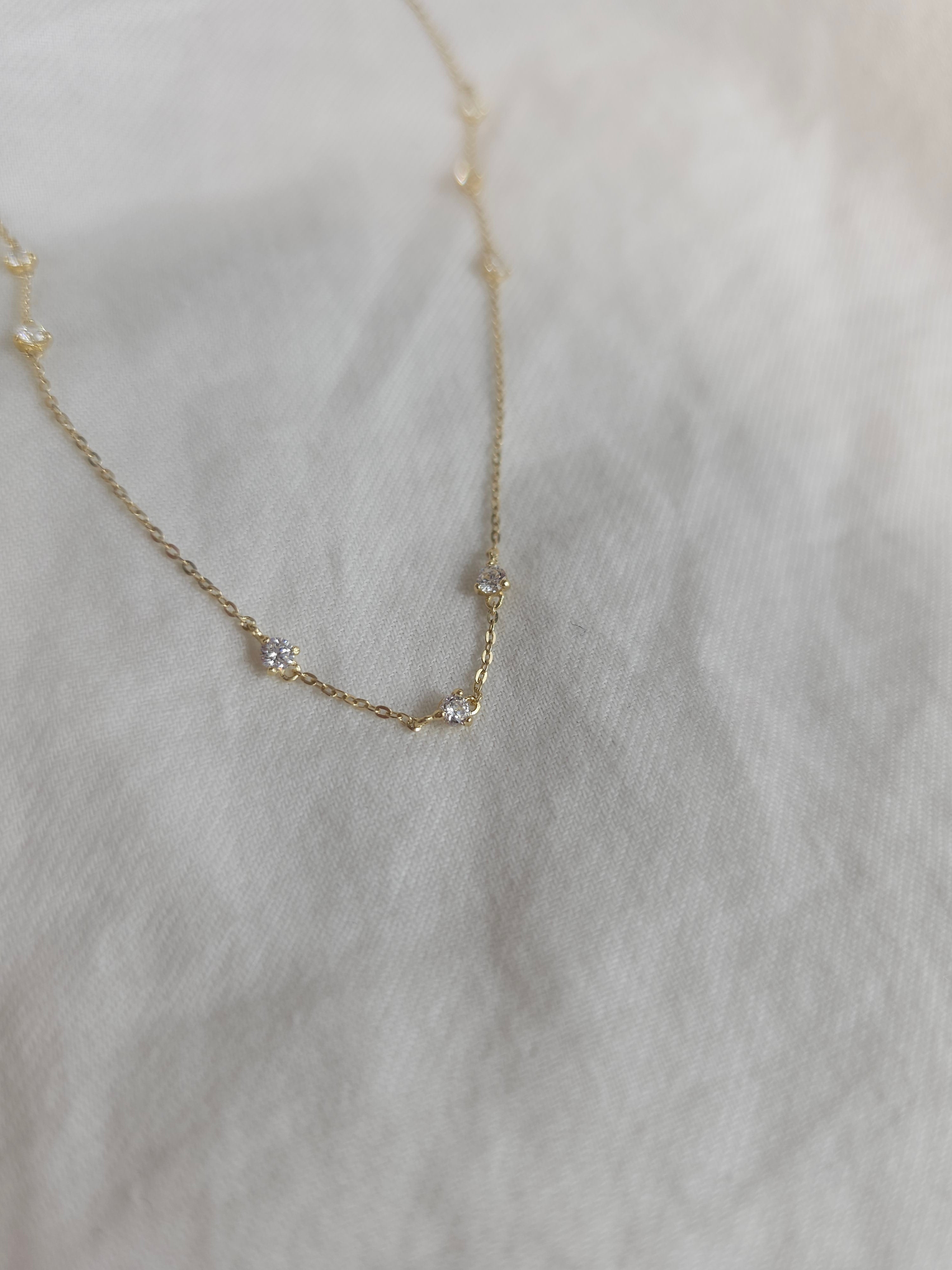 9ct delicate claw set cubic zirconia station necklet