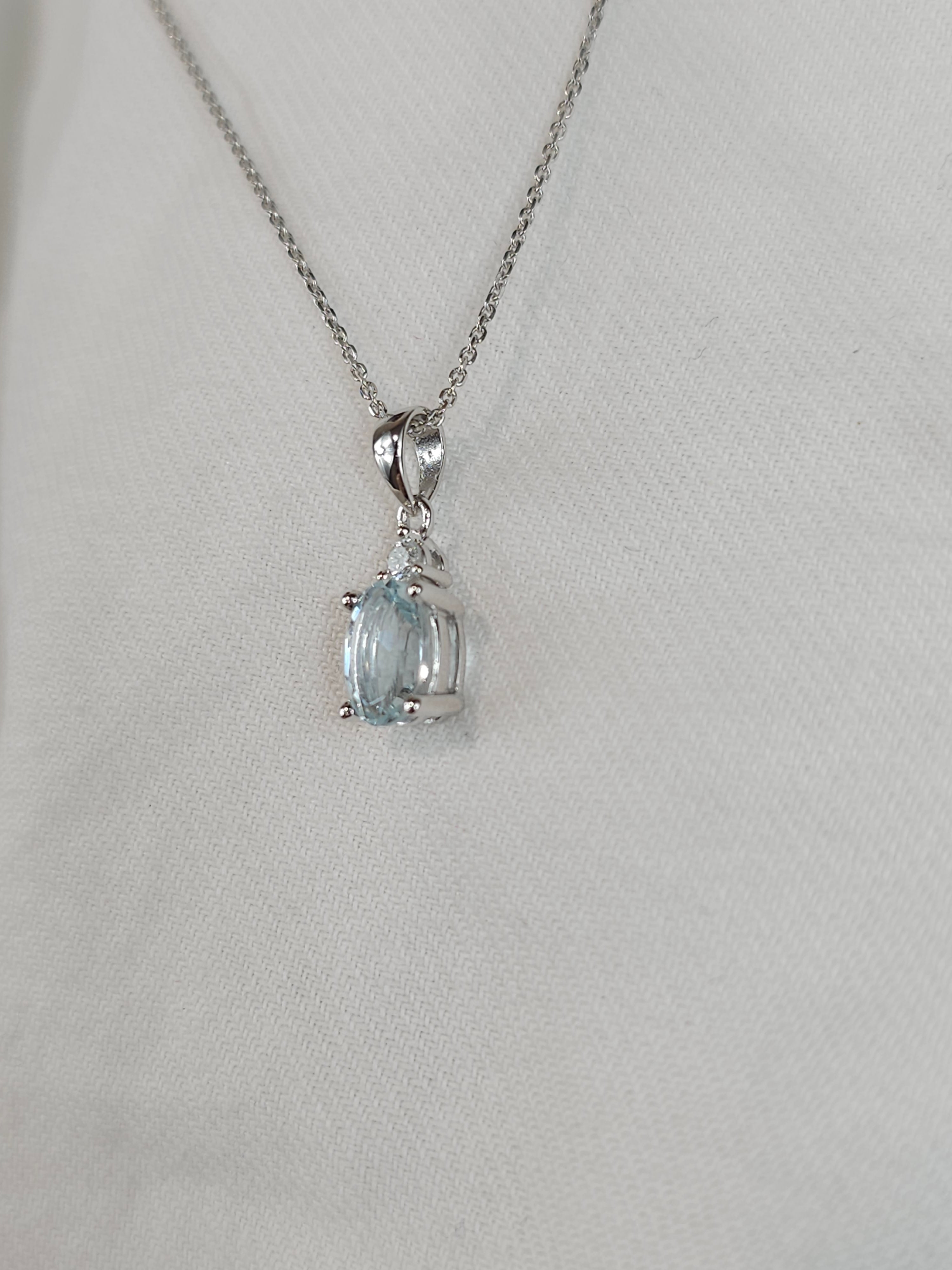 9ct white gold aquamarine & diamond pendant