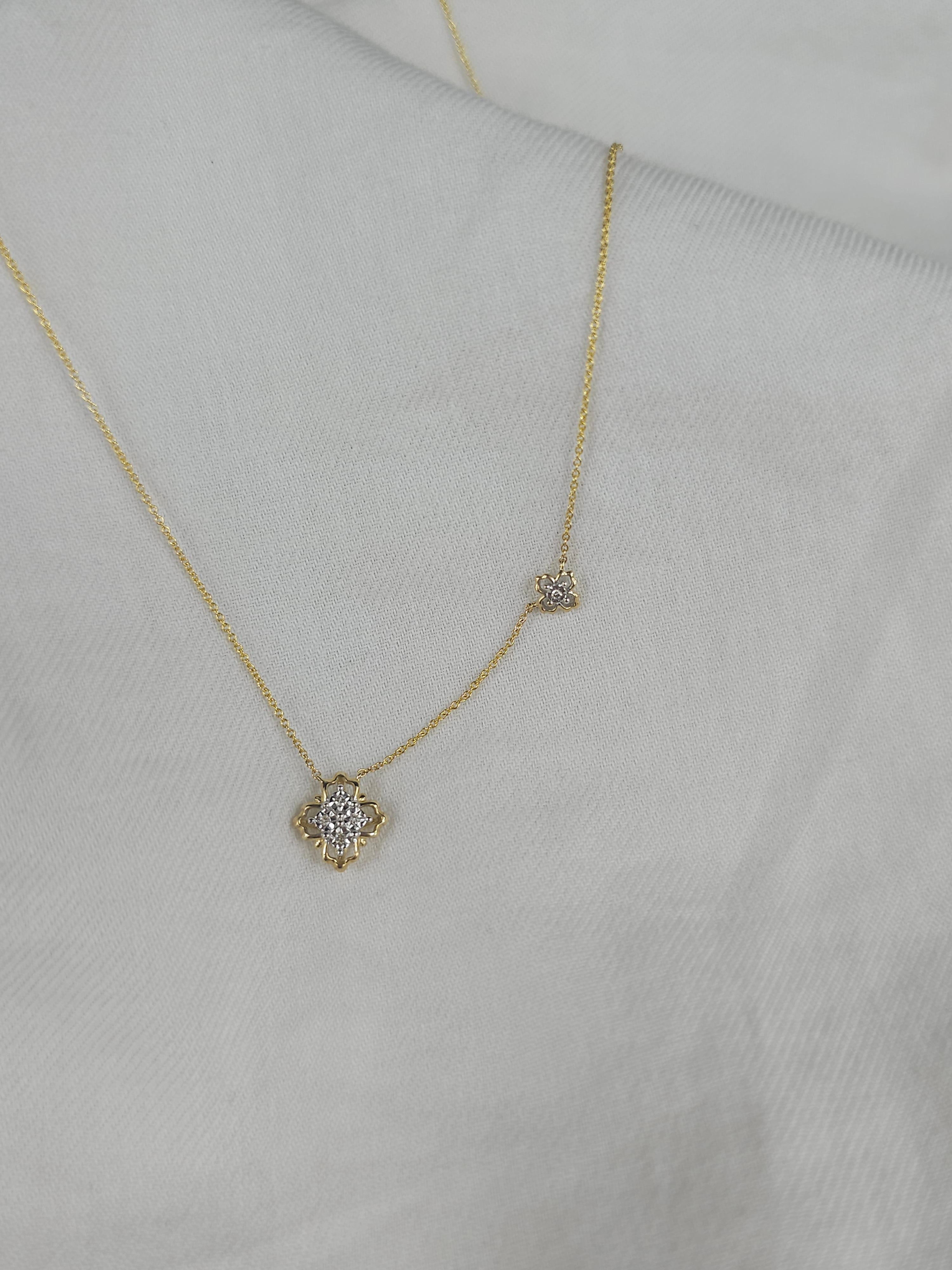9ct Yellow and White Gold Diamond necklet, 0.028ct total