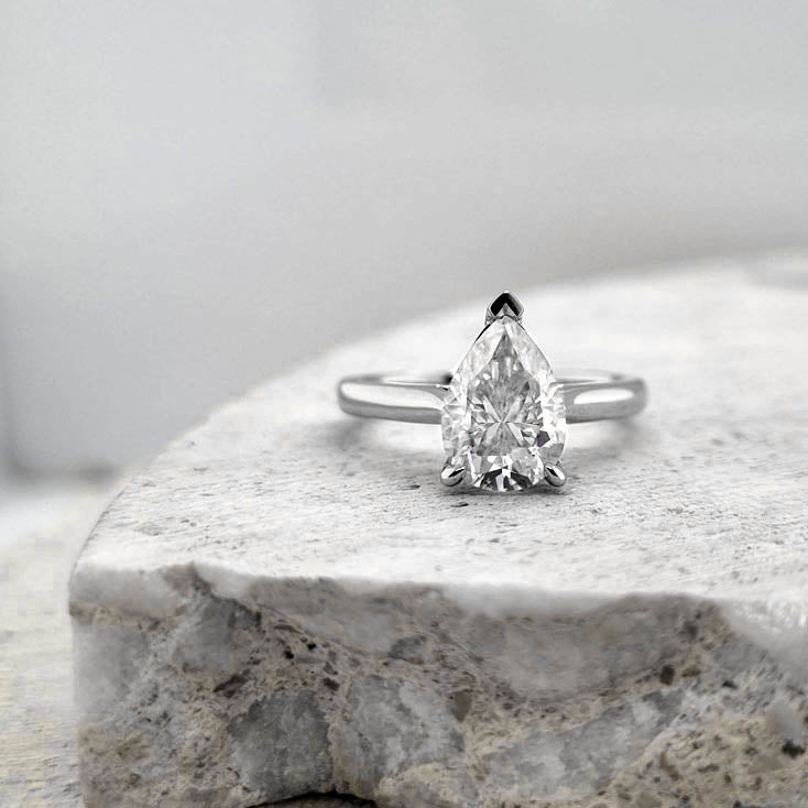 9ct White Gold Moissanite Pear Solitaire.